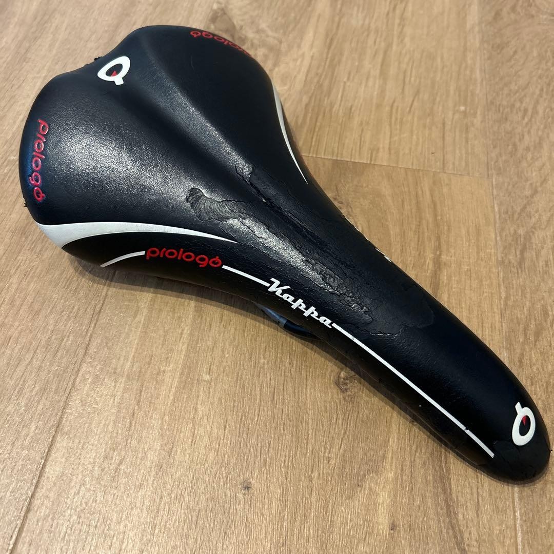 Prologo Kappa Black Red Saddle Used with Scratches Plastic Metal Frame