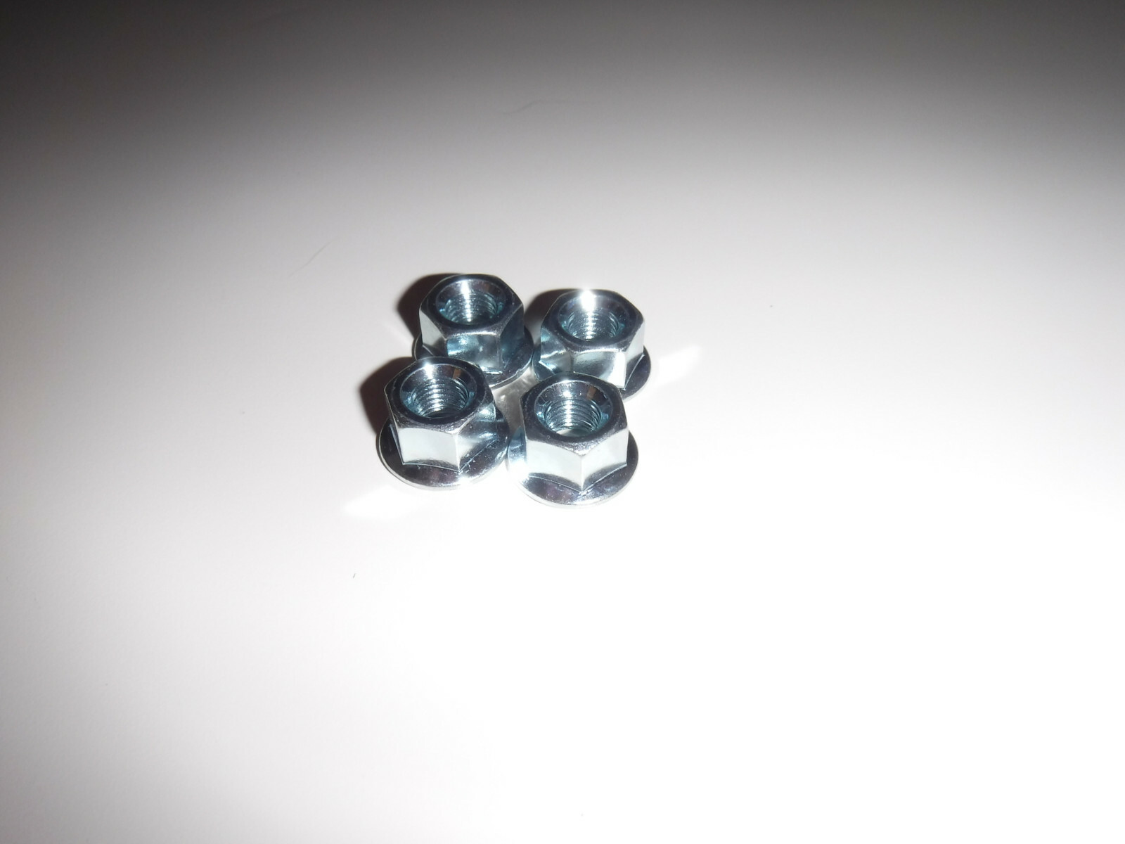 4 New Front or Rear 5/16ths x 26tpi Silver Steel Bolt-On Bicycle Hub Axle Nuts