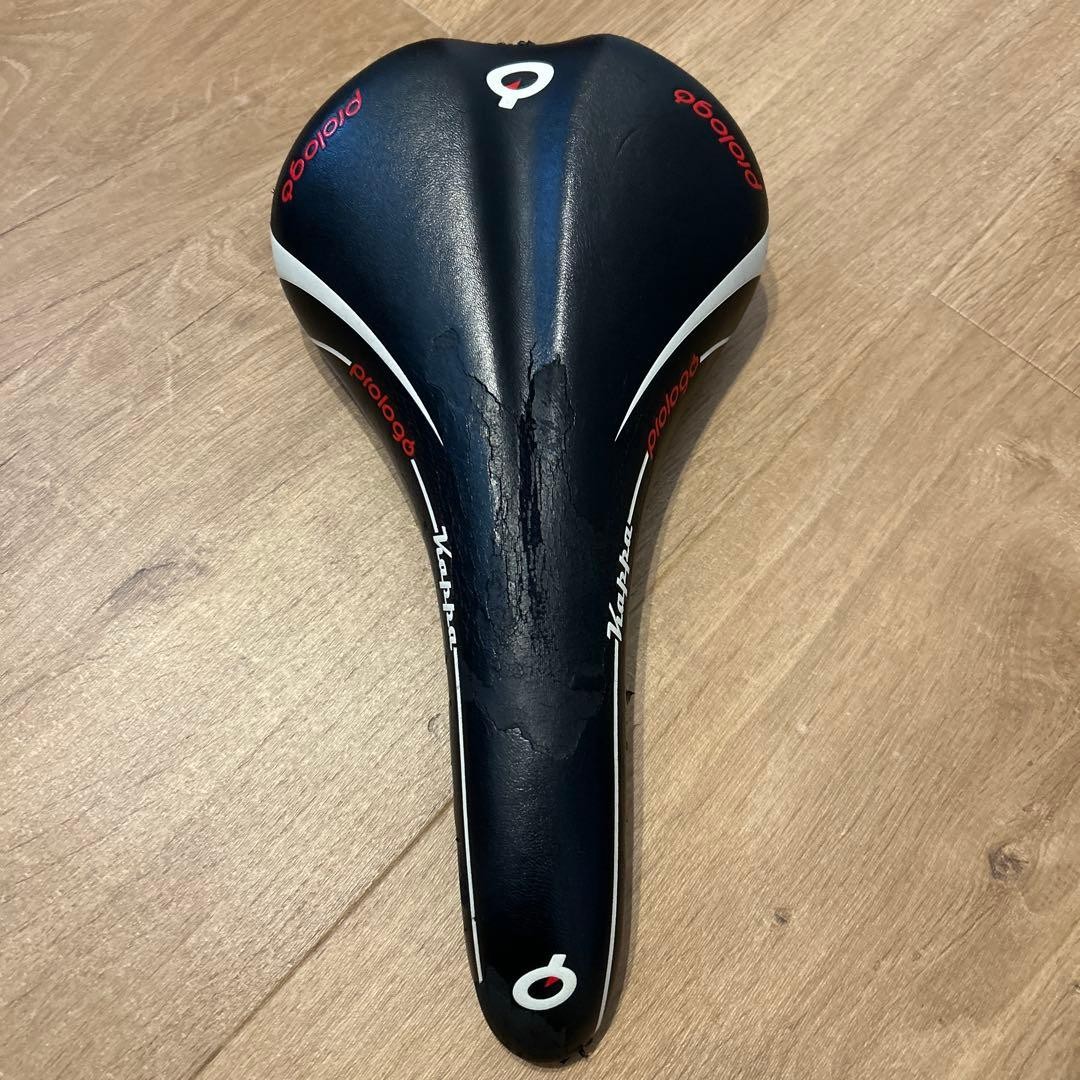 Prologo Kappa Black Red Saddle Used with Scratches Plastic Metal Frame