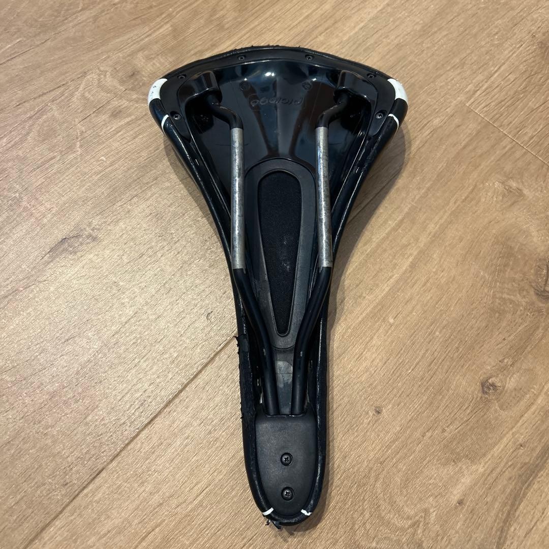 Prologo Kappa Black Red Saddle Used with Scratches Plastic Metal Frame