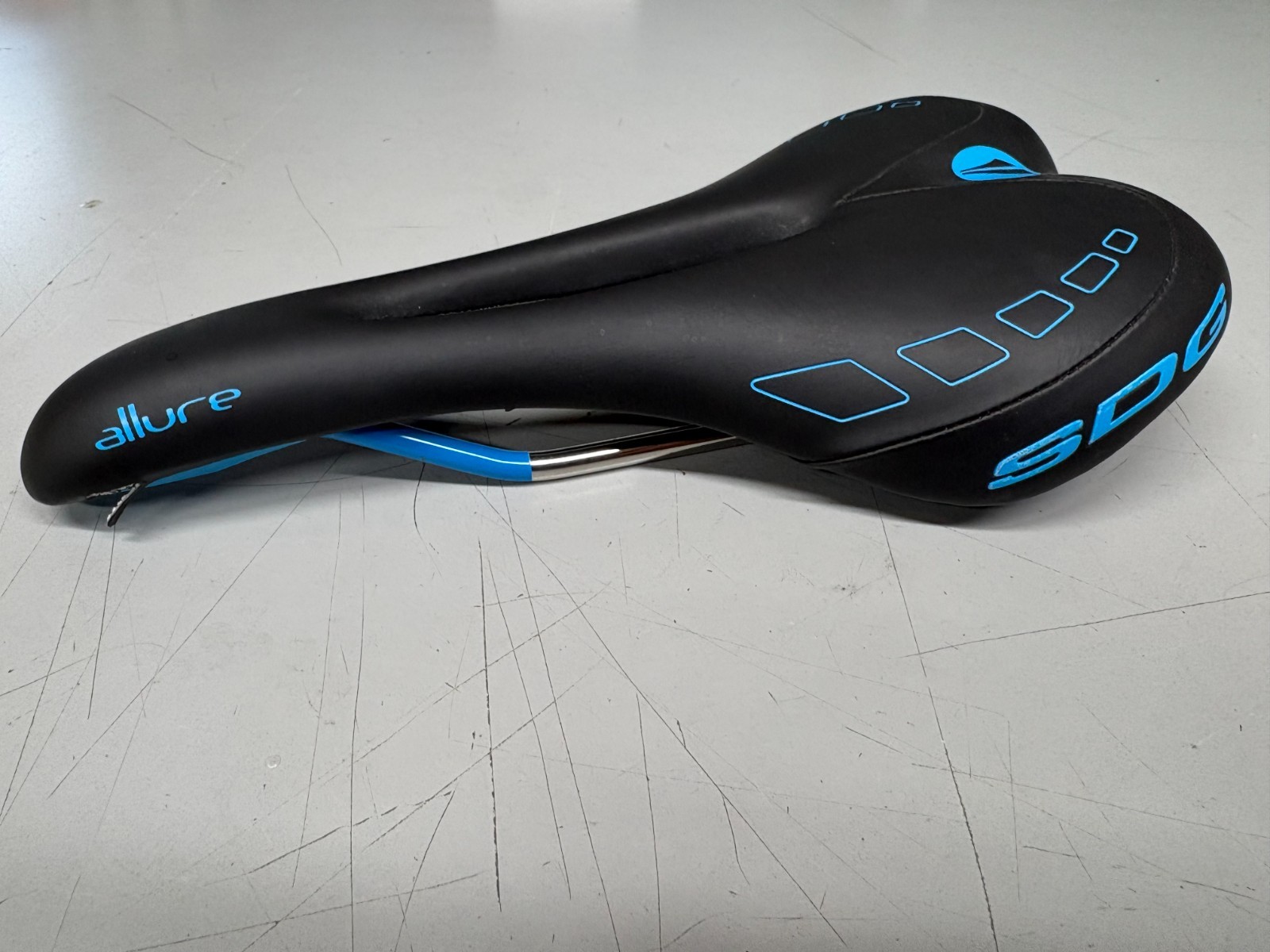 SDG Allure Bicycle Saddle Black / Blue Lux-Alloy 270mm x 140mm
