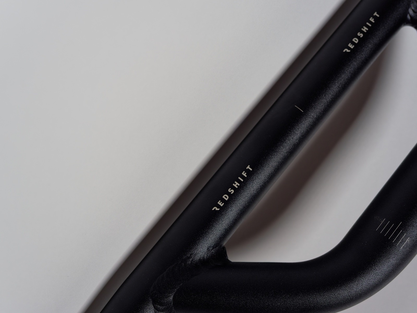 REDSHIFT Top Shelf Low Flare Handlebar Aluminum Drop 70mm of Rise, 50cm Width