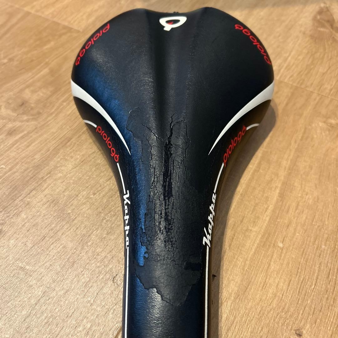 Prologo Kappa Black Red Saddle Used with Scratches Plastic Metal Frame