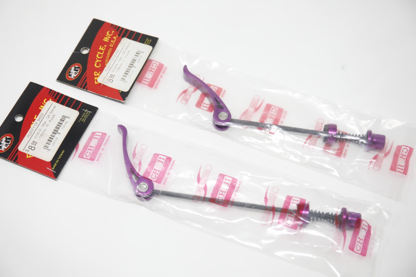 F&R Cycle purple quick release set front and rear – new