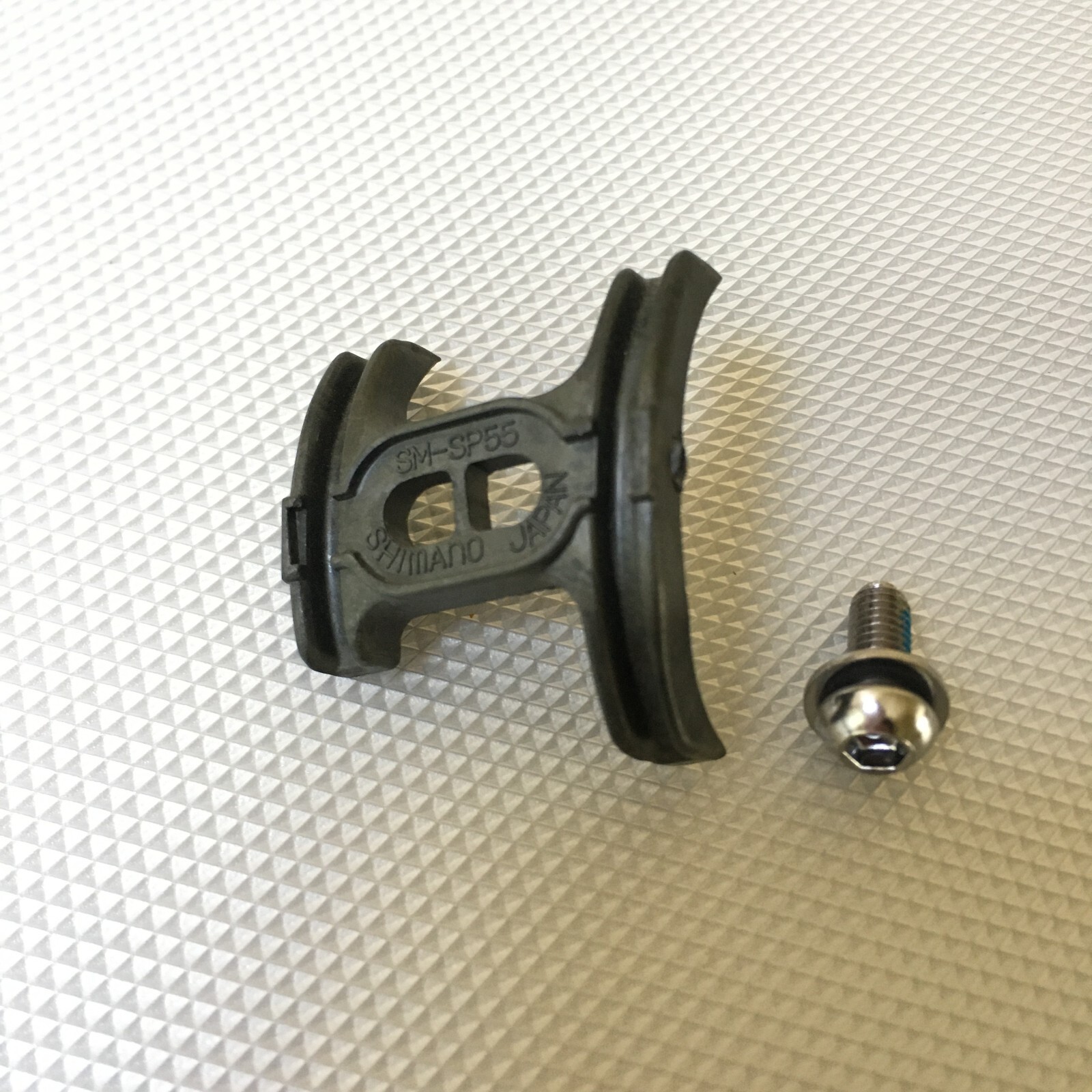 Shimano SM-SP17-T / SM-SP55 Plastic Bottom Bracket Cable Guide – New