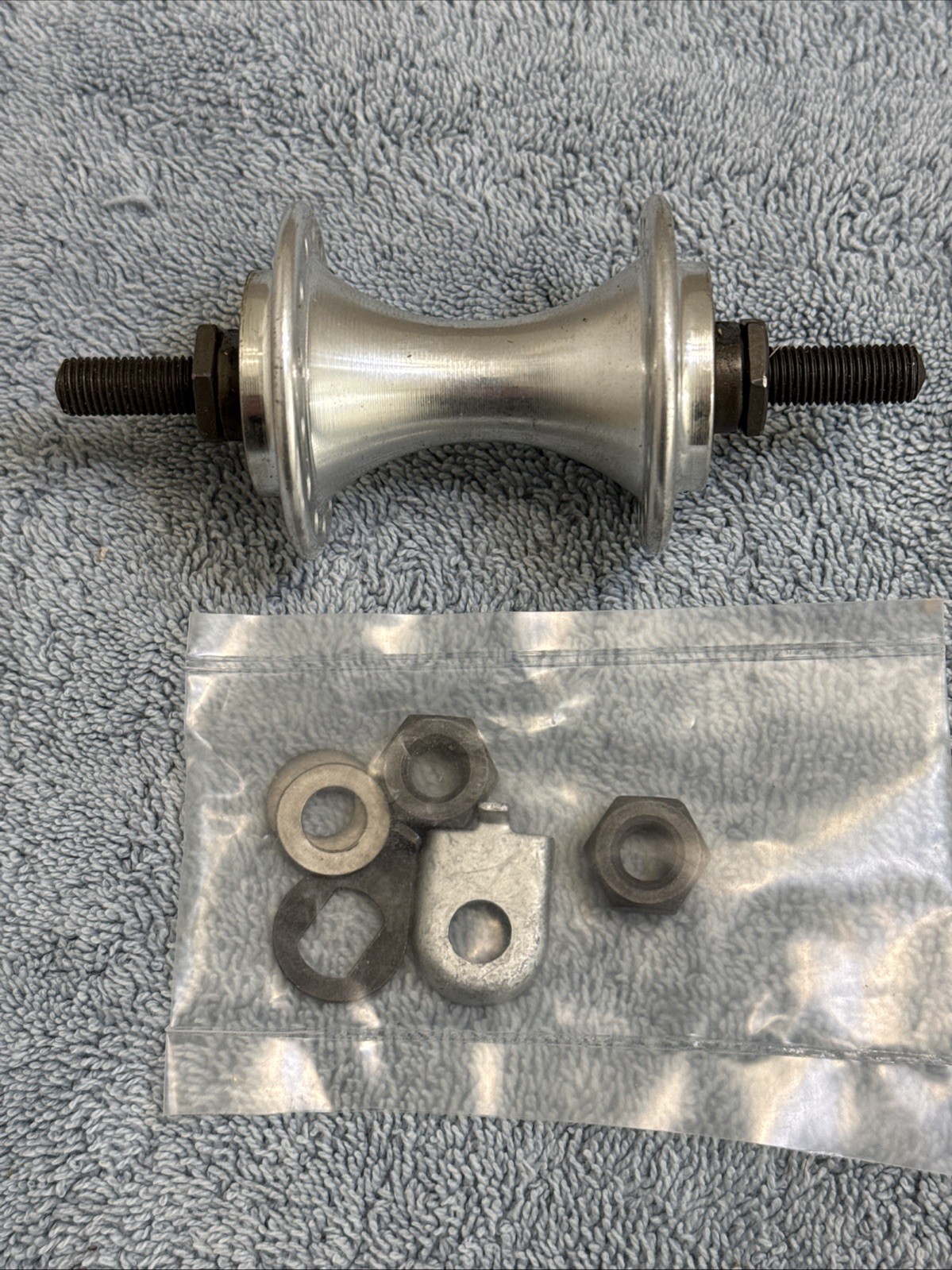 Brompton Front Hub 28h Silver -75mm Over Locknut Dimension – 114mm axle length