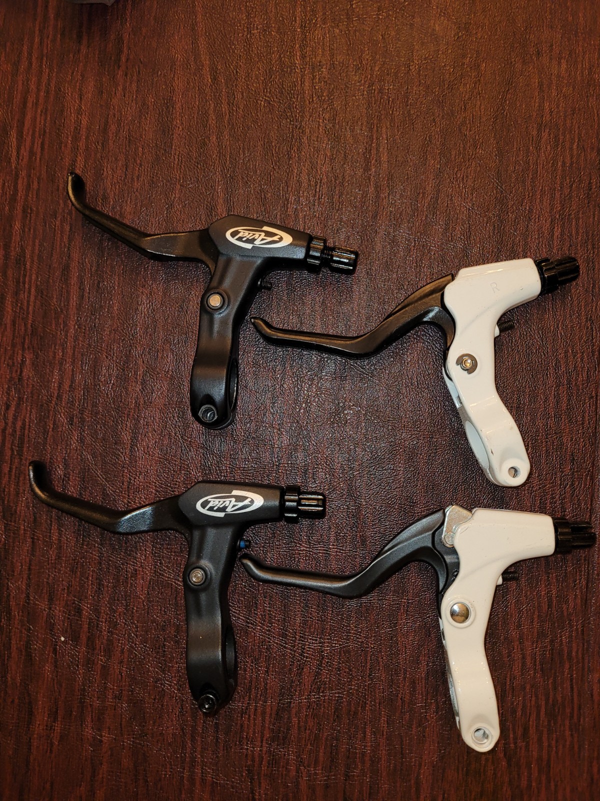 1 Pair FR-5 BLACK Brake Levers & 1 Pair of Unbranded White Brake Levels.
