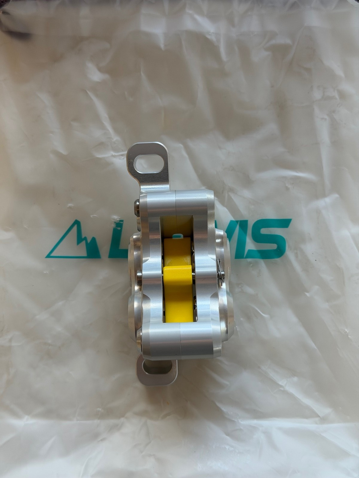 Lewis LH4 4-piston caliper, SILVER, NEW. Includes new pads.