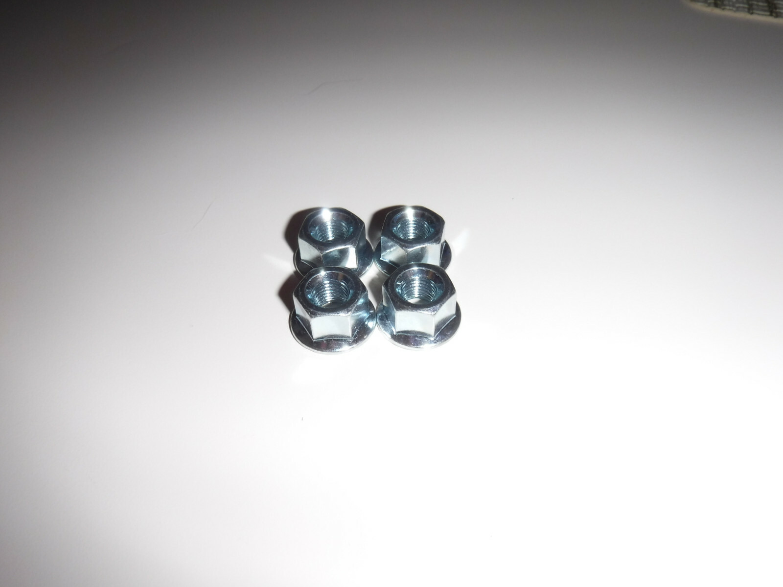 4 New Front or Rear 5/16ths x 26tpi Silver Steel Bolt-On Bicycle Hub Axle Nuts