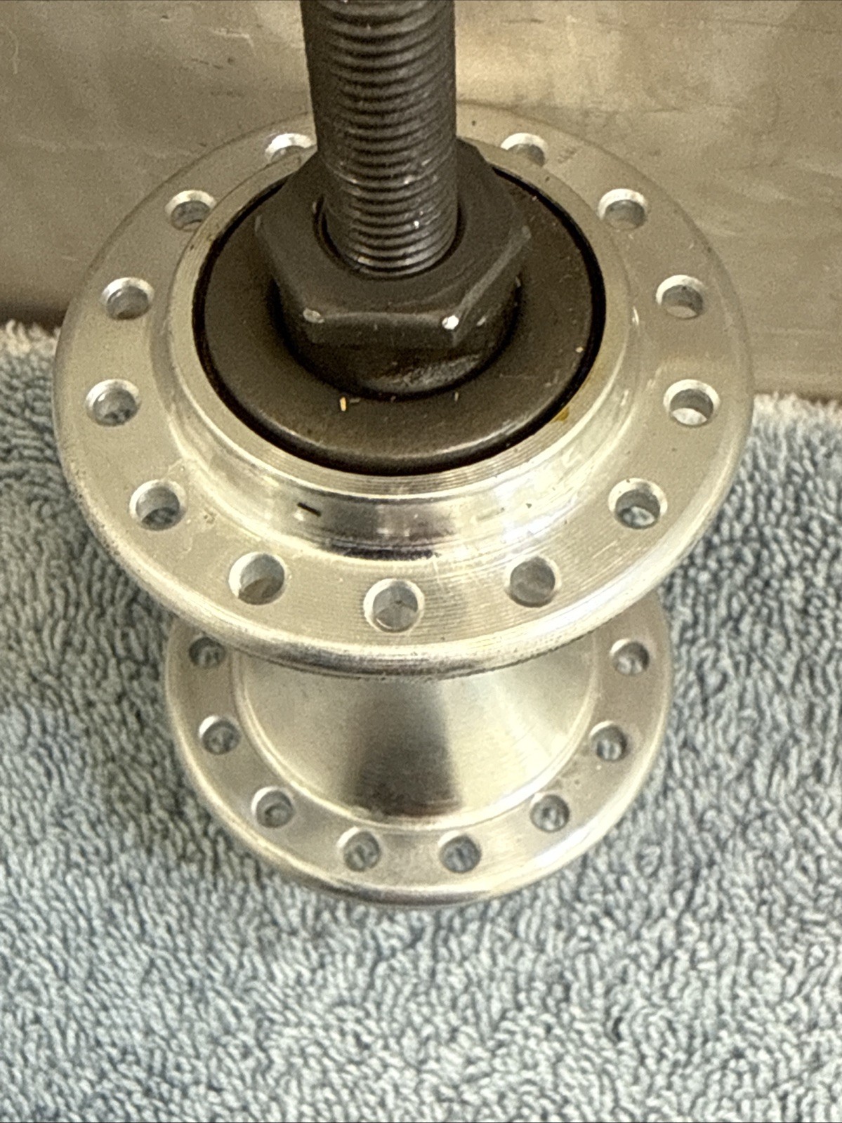 Brompton Front Hub 28h Silver -75mm Over Locknut Dimension – 114mm axle length
