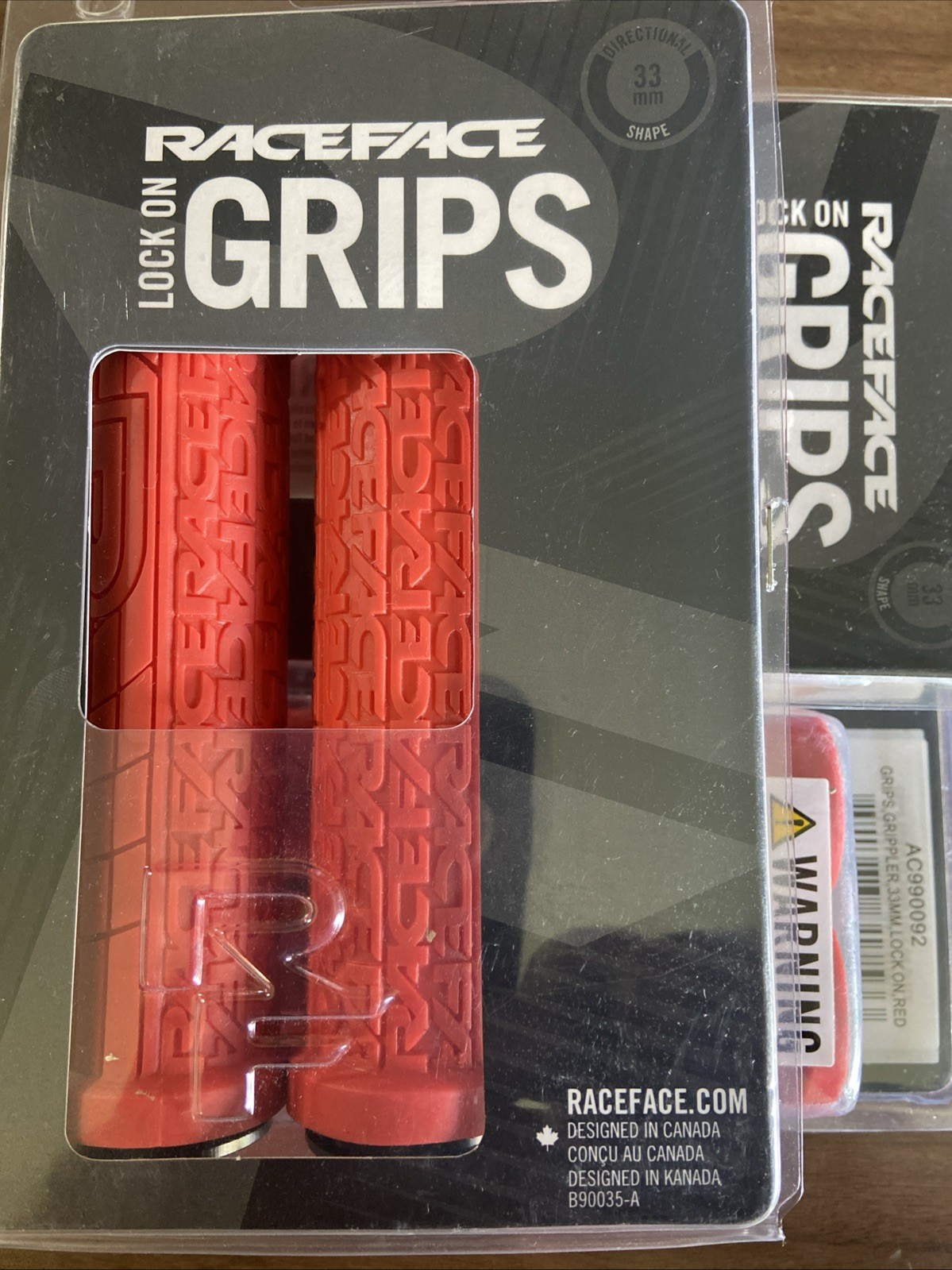 RaceFace Grippler Grips – Red, Lock-On, 33mm – Grip (NEW-IN PKG) AC990092