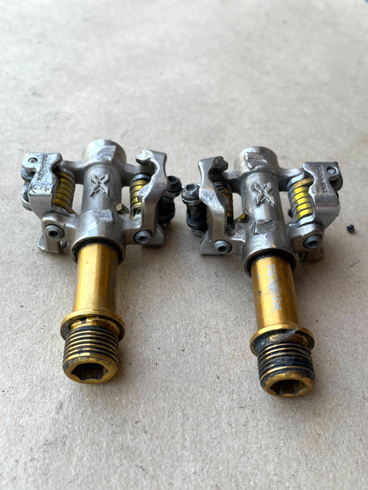 Xpedo «posi-lock» clipless pedals Silver/Gold