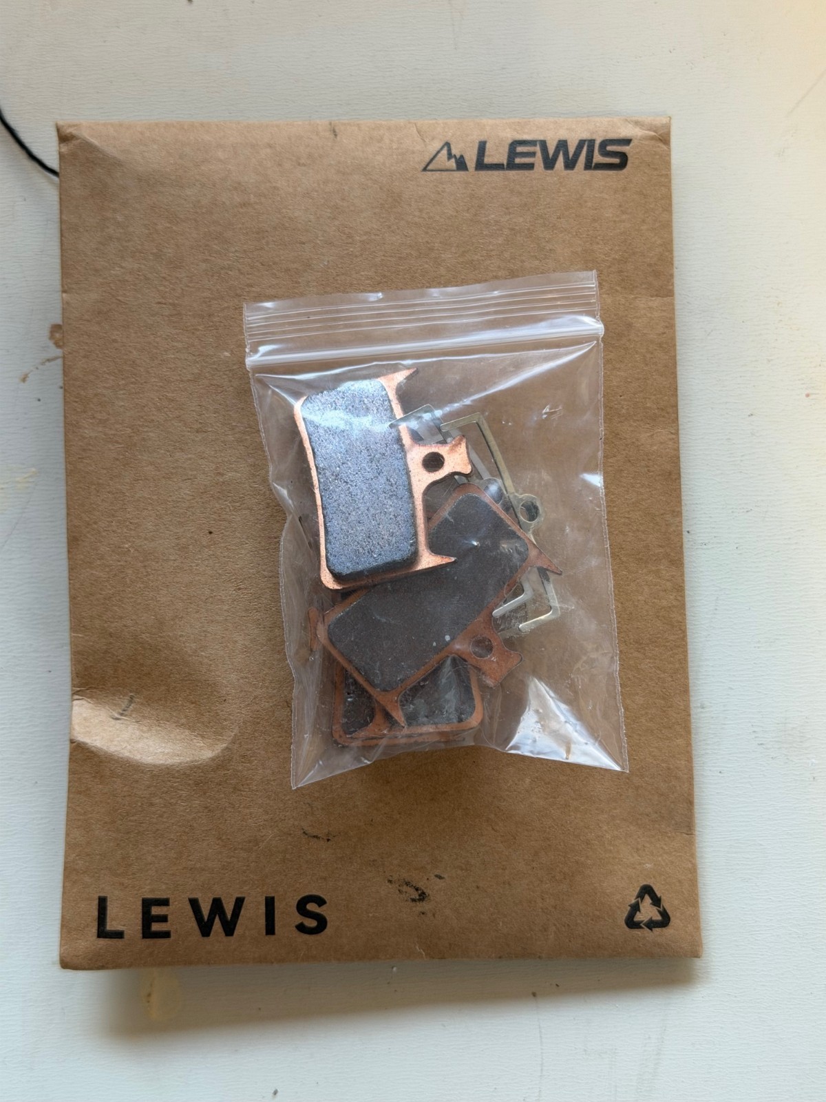 Lewis LH4 4-piston caliper, SILVER, NEW. Includes new pads.