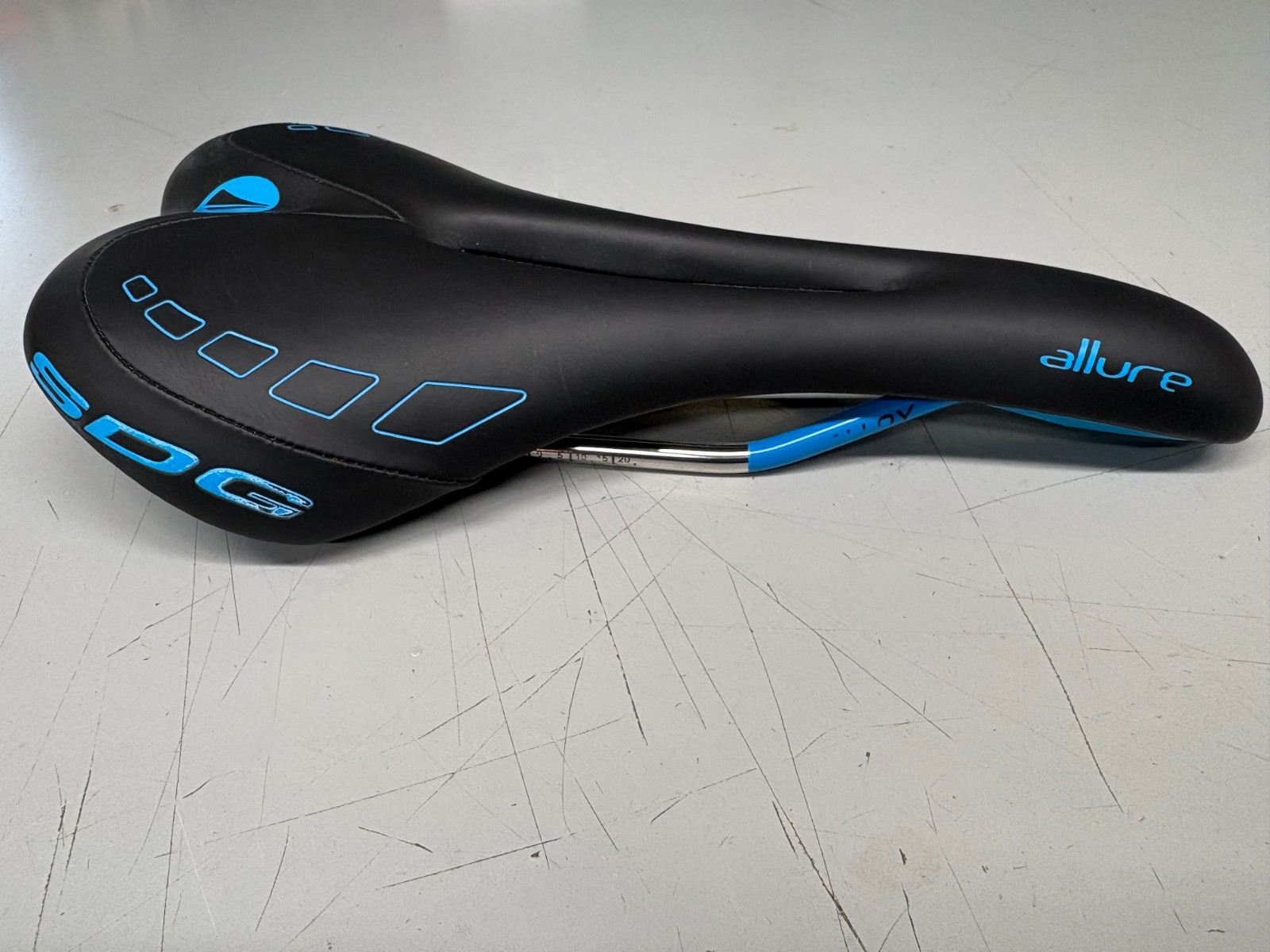 SDG Allure Bicycle Saddle Black / Blue Lux-Alloy 270mm x 140mm