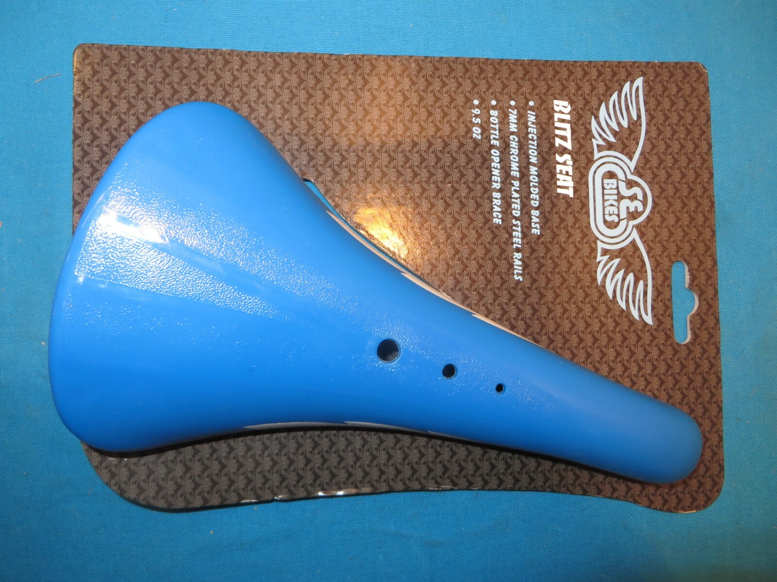 SE Racing BMX Blitz Blue Bicycle Seat with Bottle Opener Brace – New