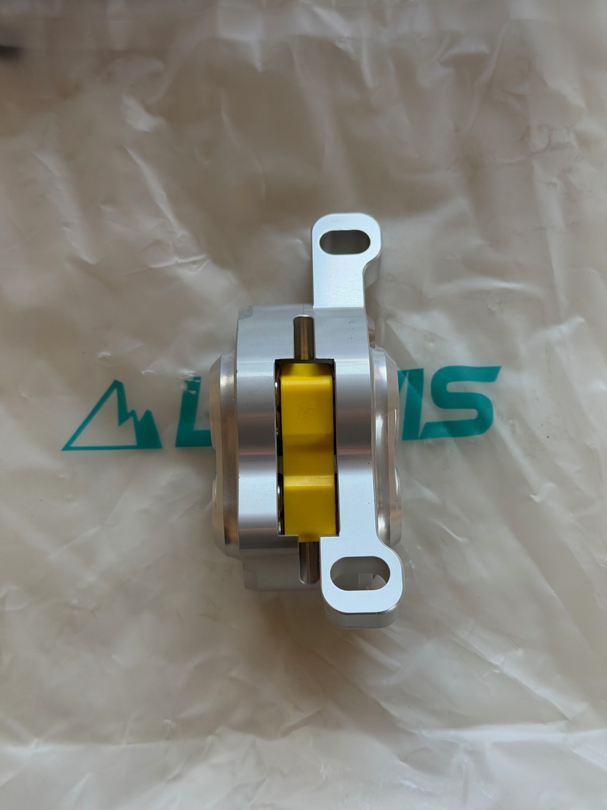 Lewis LH4 4-piston caliper, SILVER, NEW. Includes new pads.