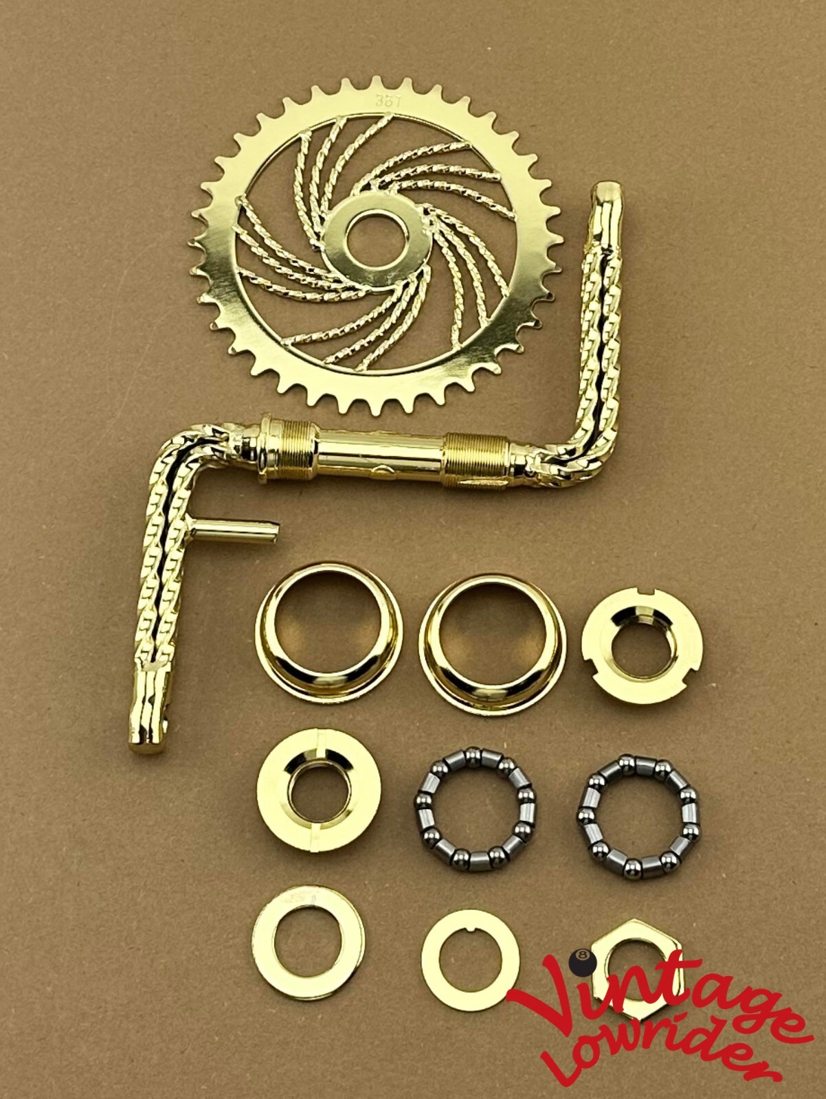 VINTAGE LOWRIDER QUADRUPLE TWISTED ONE PIECE GOLD CRANK W/TWISTED SPROCKET & B.B