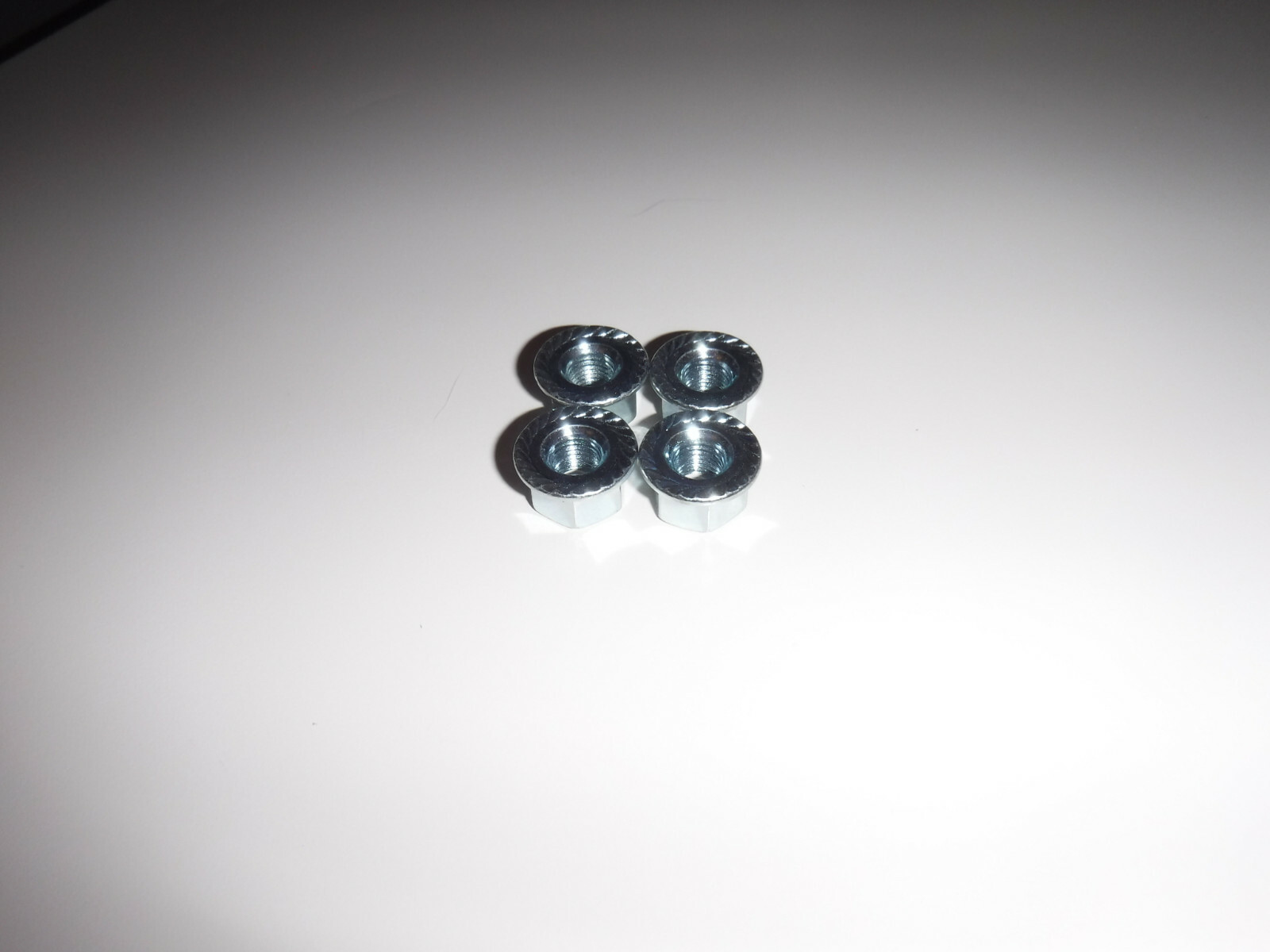 4 New Front or Rear 5/16ths x 26tpi Silver Steel Bolt-On Bicycle Hub Axle Nuts