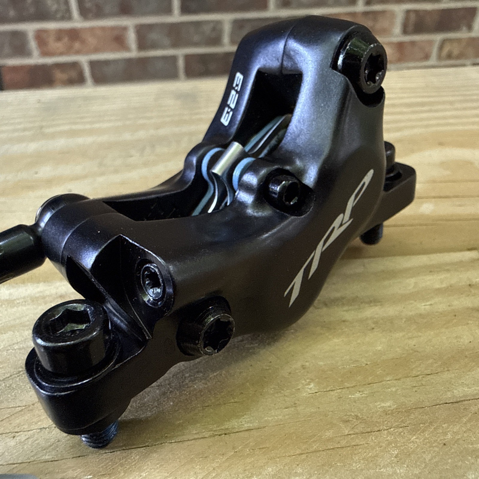 TRP Slate Evo Hydraulic Disc Brake (Front Left) — Post Mount with 203mm Rotor