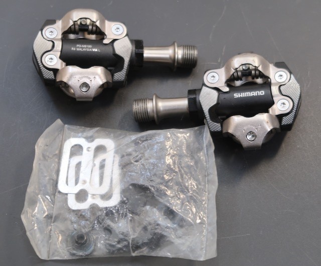 Shimano Deore XT PD-M8100 SPD clipless mountain bike pedals with new cleats