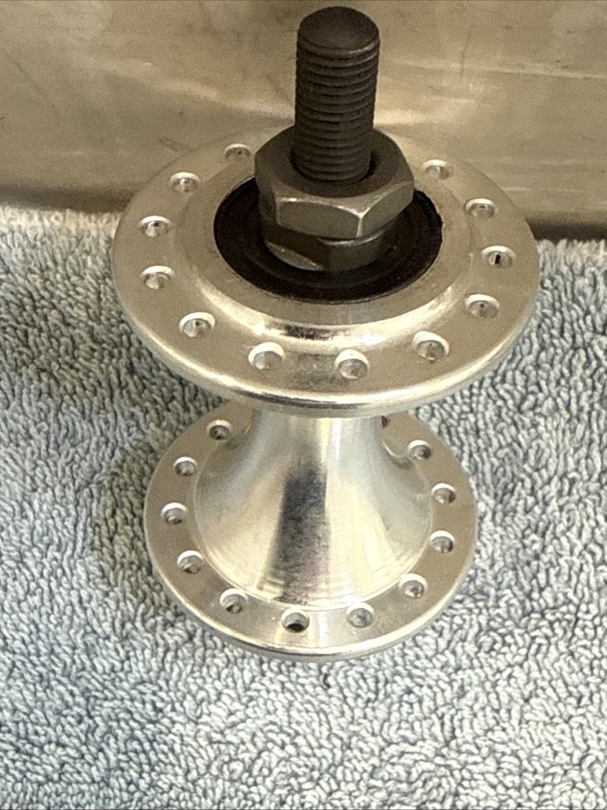 Brompton Front Hub 28h Silver -75mm Over Locknut Dimension – 106mm axle length