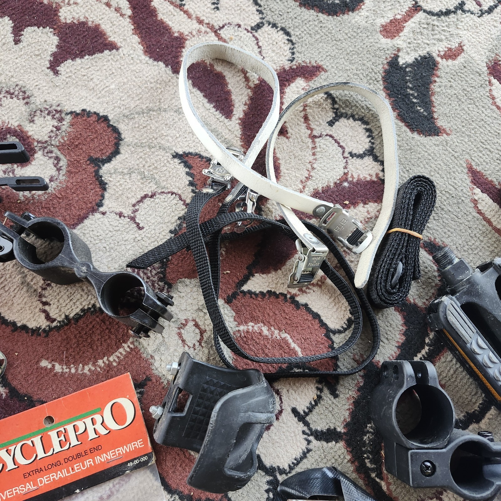 Lot of bicycle Supplies repairs pump pedals straps maps, reflectors, helmet pads