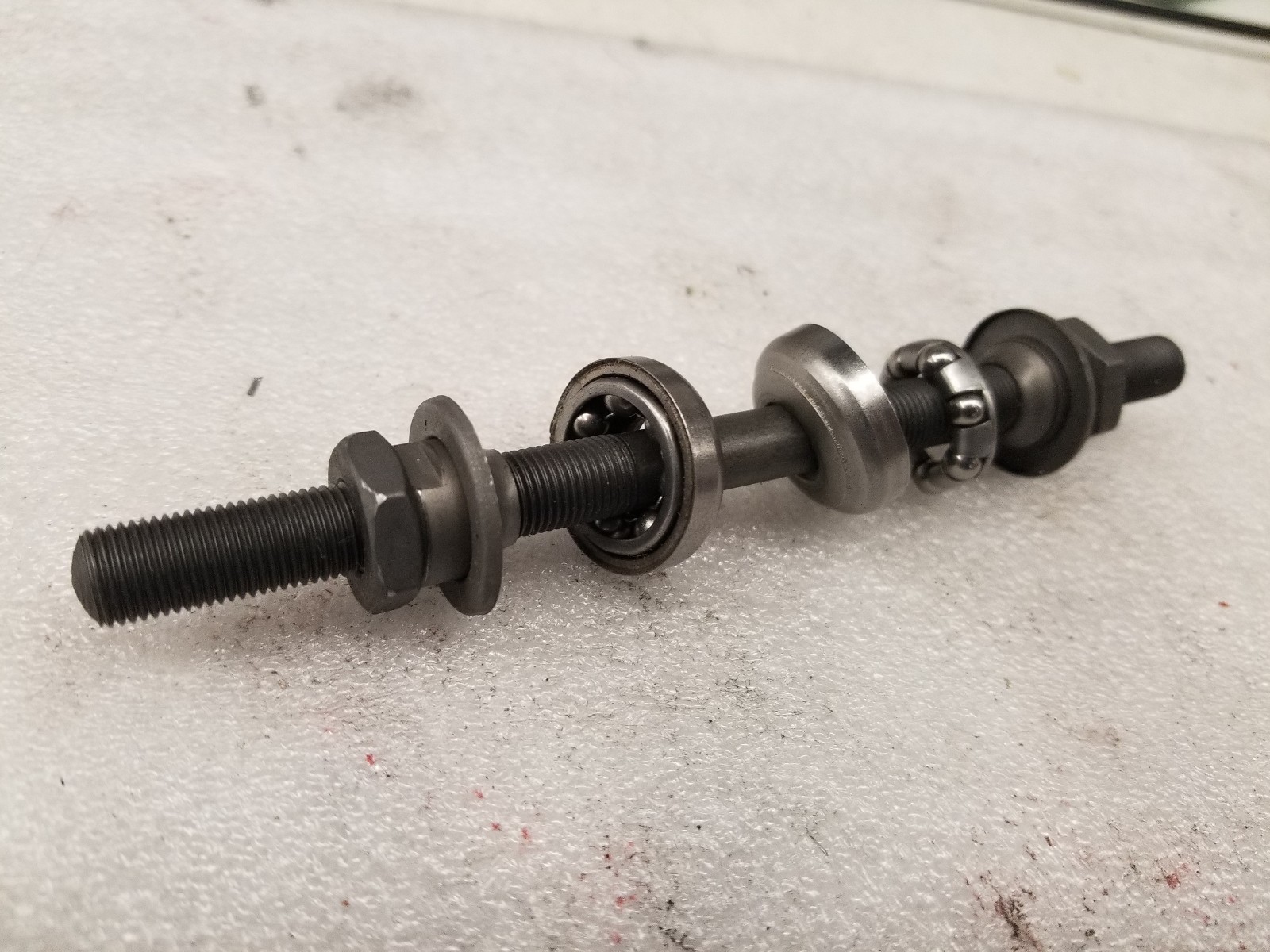 FRONT AXLE 150-MM X 3/8″, 26 T.P.I., WITH 2-BEARING RETAINERS #-5  6 X 3/8″NEW