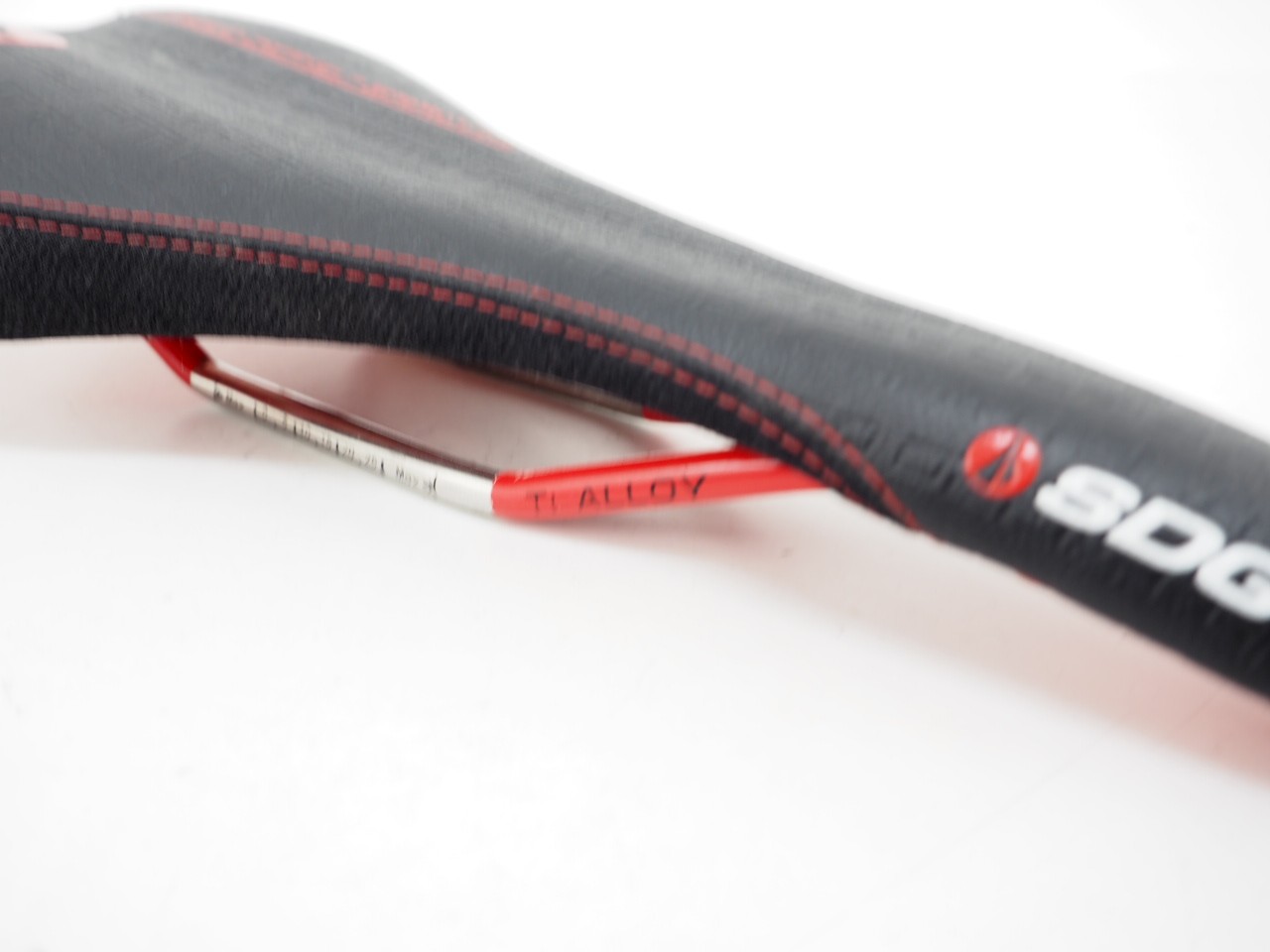 SDG Circuit Bicycle Saddle Black / Red Titanium Hollow Rails 280mm x 135mm