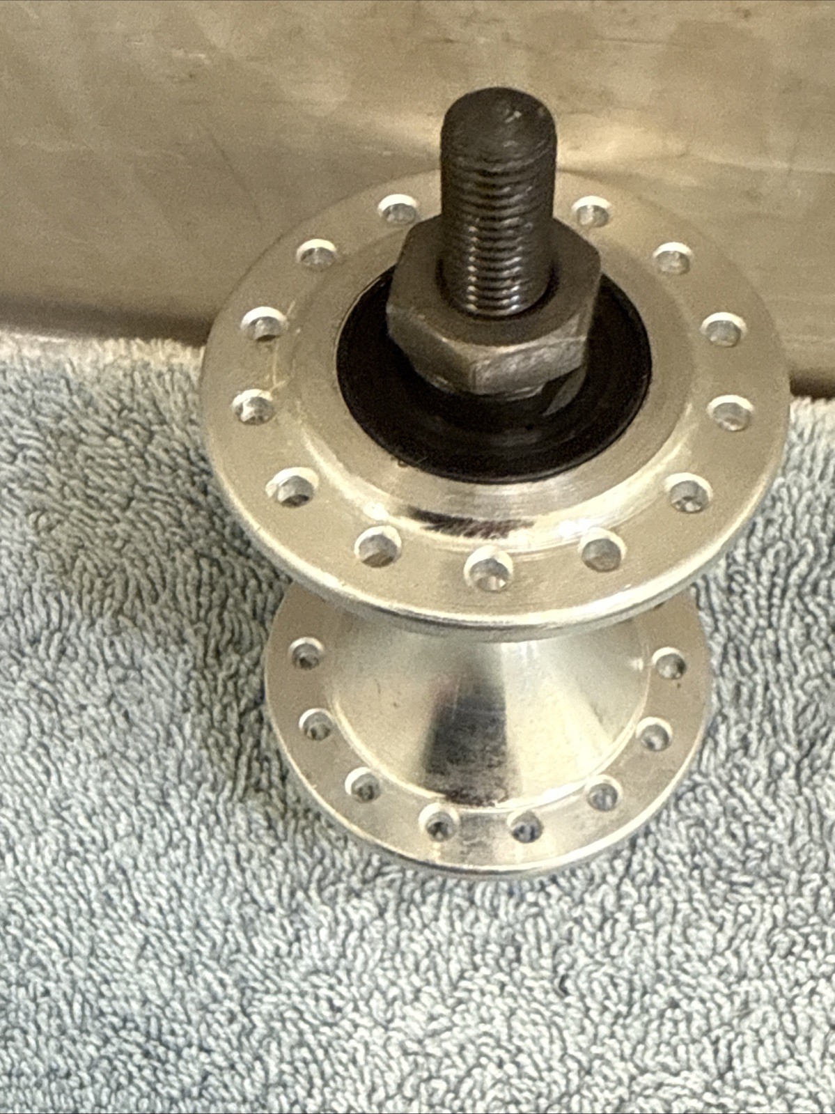 Brompton Front Hub 28h Silver -75mm Over Locknut Dimension – 106mm axle length