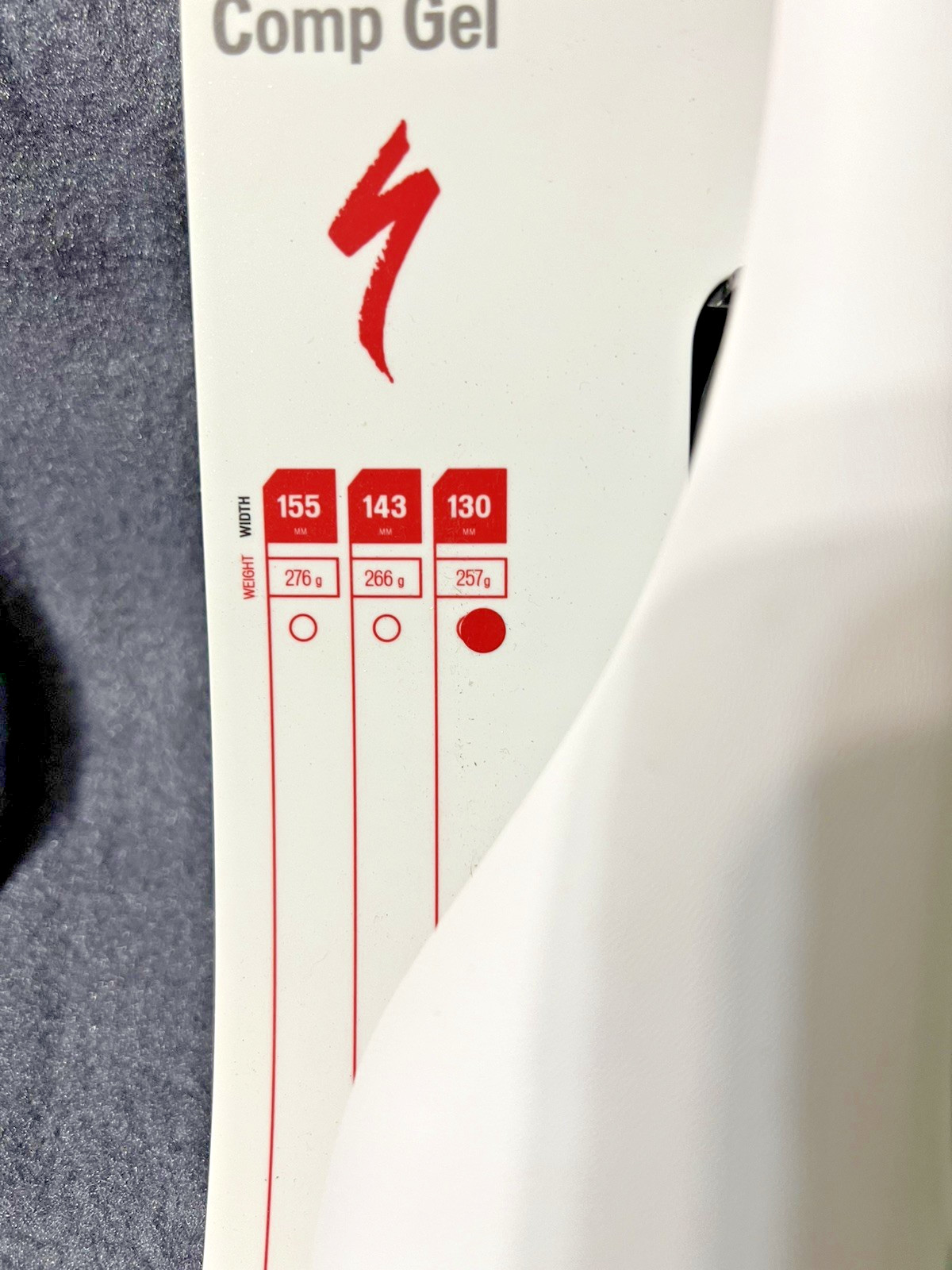 New White Specialized Toupe Comp Gel 130mm 257 G road saddle. Hollow Cromo