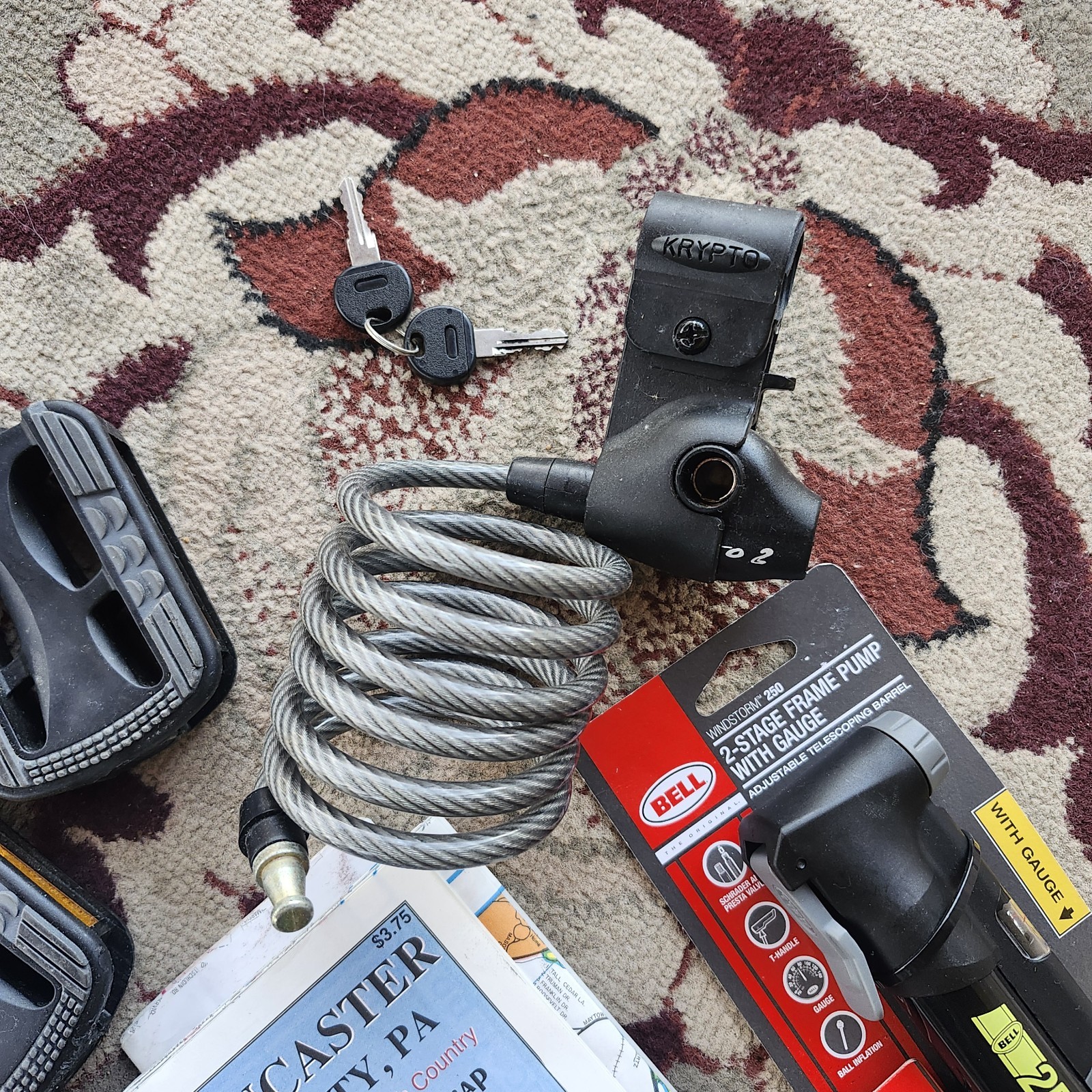 Lot of bicycle Supplies repairs pump pedals straps maps, reflectors, helmet pads
