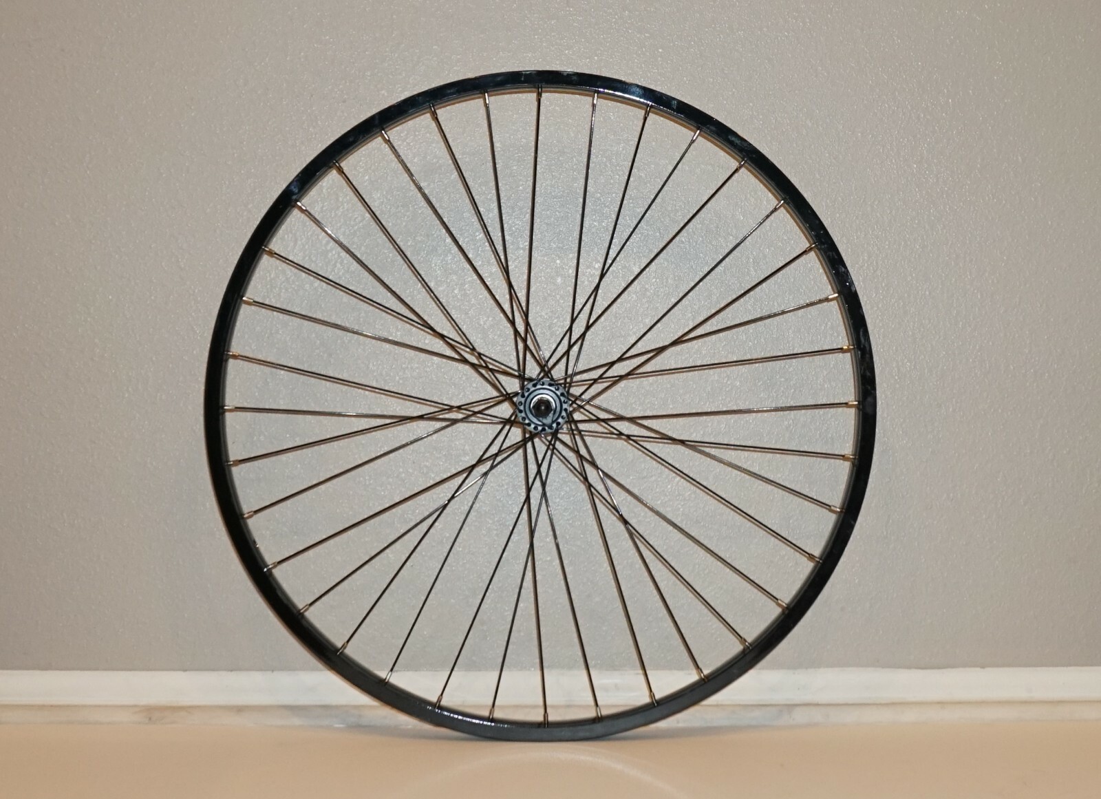26″ x 1.75″ Alloy Front Wheel 14g 36 SS Spokes 100mm O.L.D Glossy Black