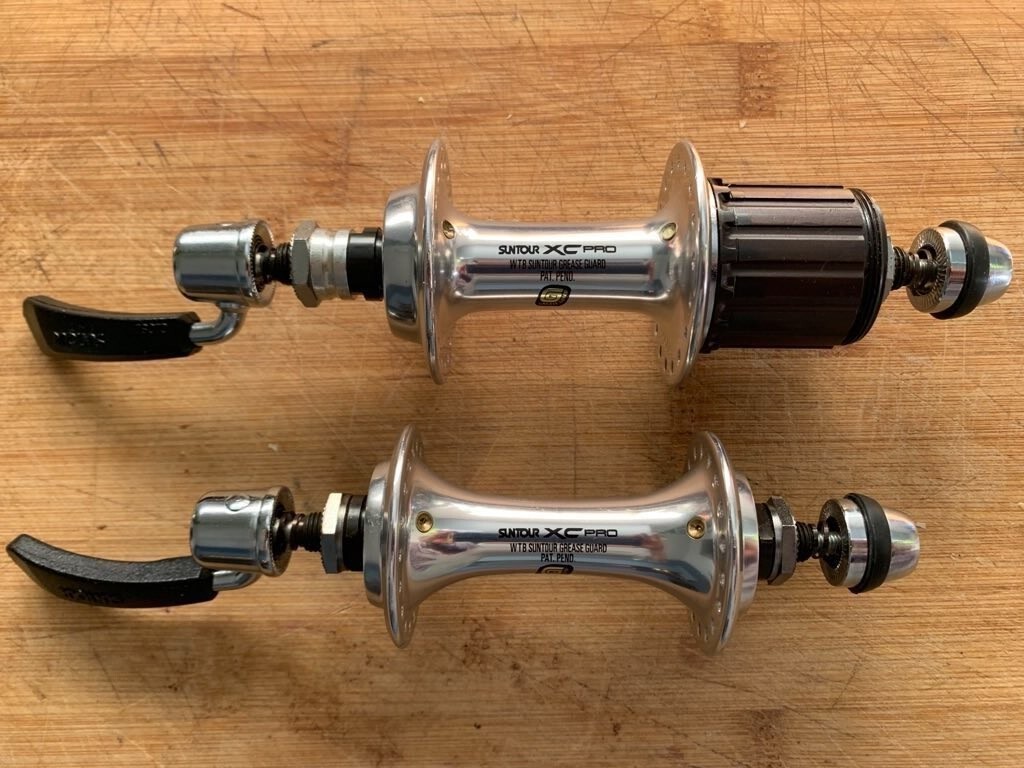 New NOS Suntour XC PRO Wtb Grease Guard hub set 7speed 36 holes quick release