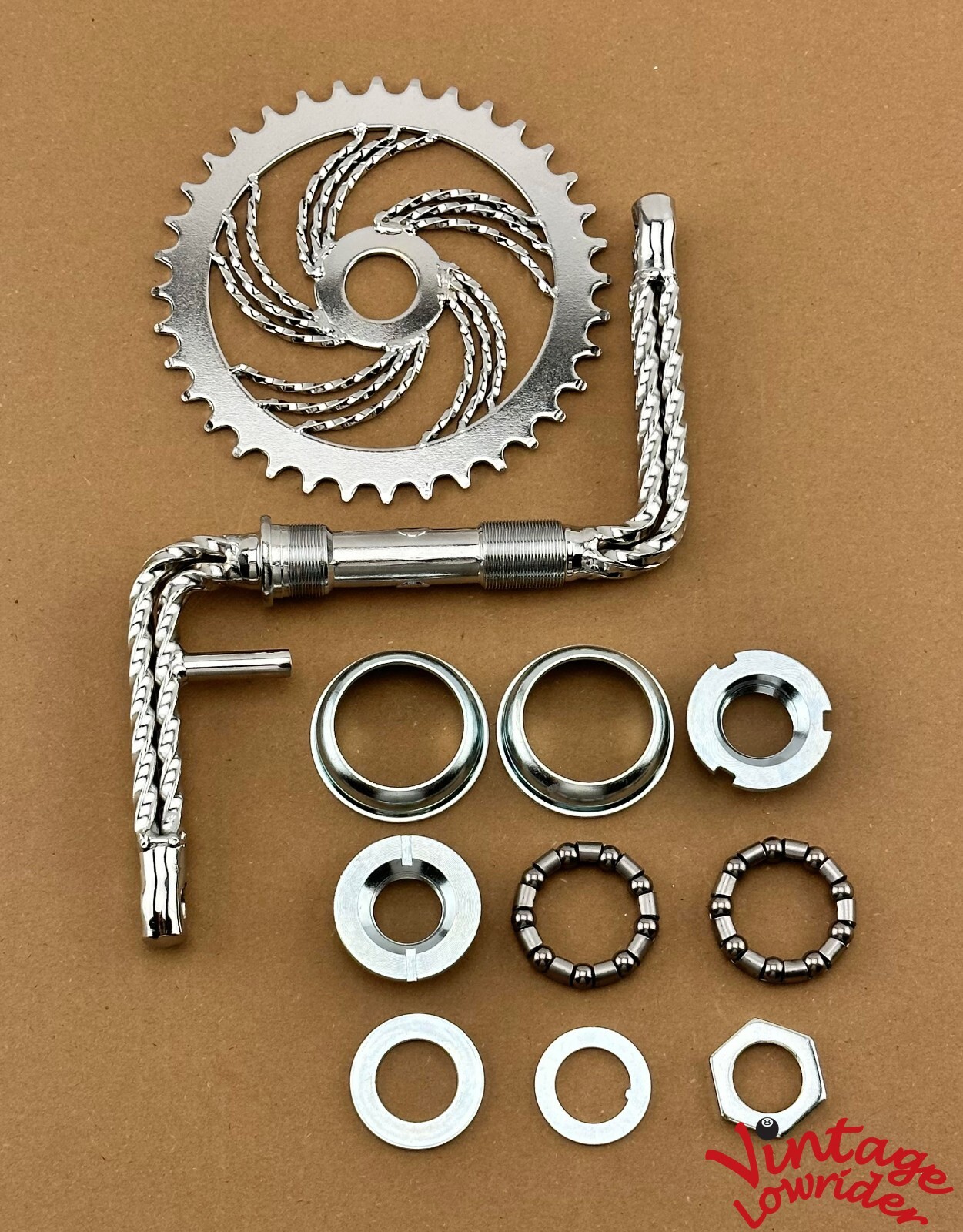 VINTAGE LOWRIDER QUADRUPLE TWISTED 1 PIECE CHROME CRANK W/TWISTED SPROCKET & B.B