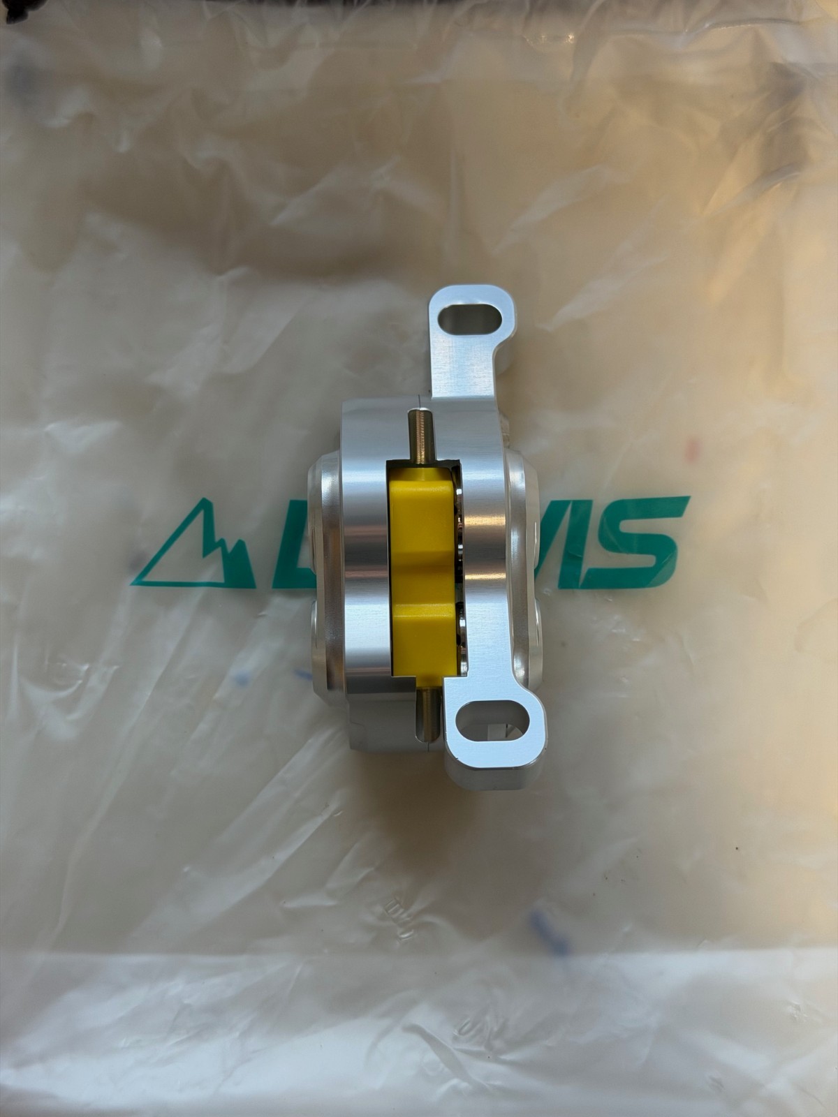 Lewis LH4 4-piston caliper, SILVER, NEW. Includes new pads.