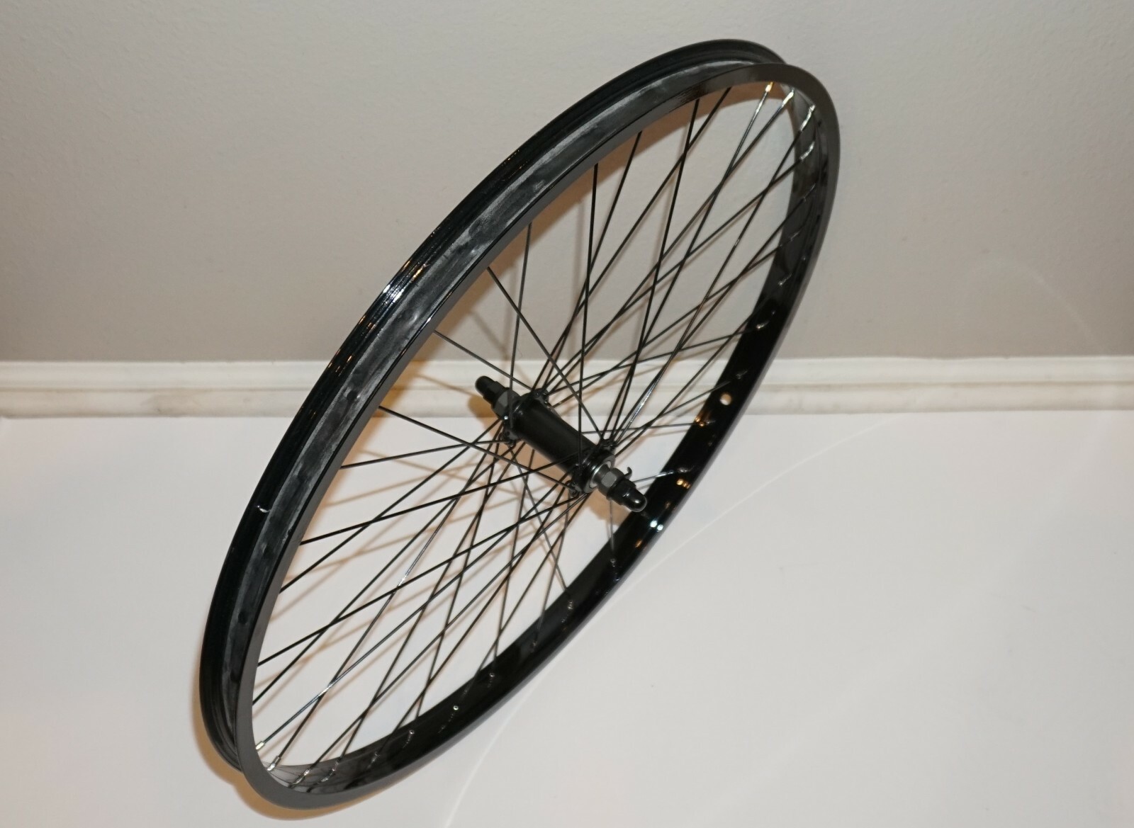 26″ x 1.75″ Alloy Front Wheel 14g 36 SS Spokes 100mm O.L.D Glossy Black