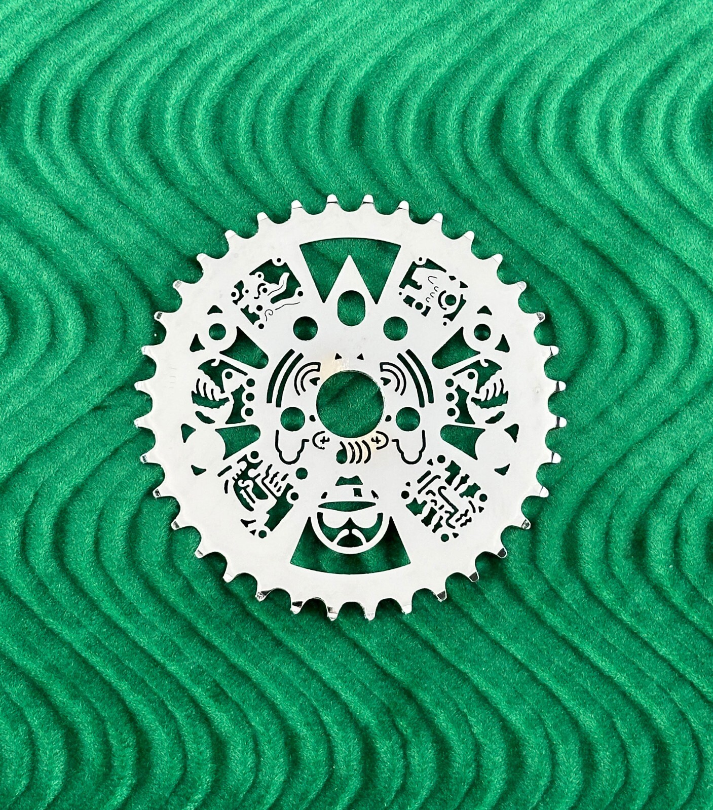 BICYCLE 36T LASER CUT AZTEC CALENDAR W/ LOWRIDER HEAD SPROCKET.