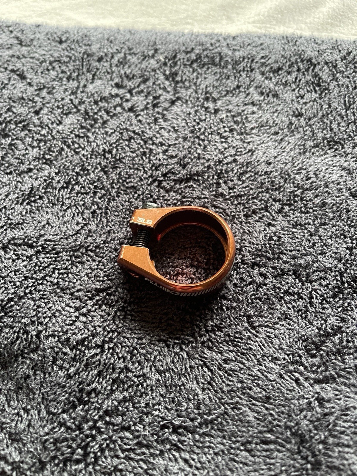 Deity (bronze) 31.8mm Seatpost Clamp, 1pc used.