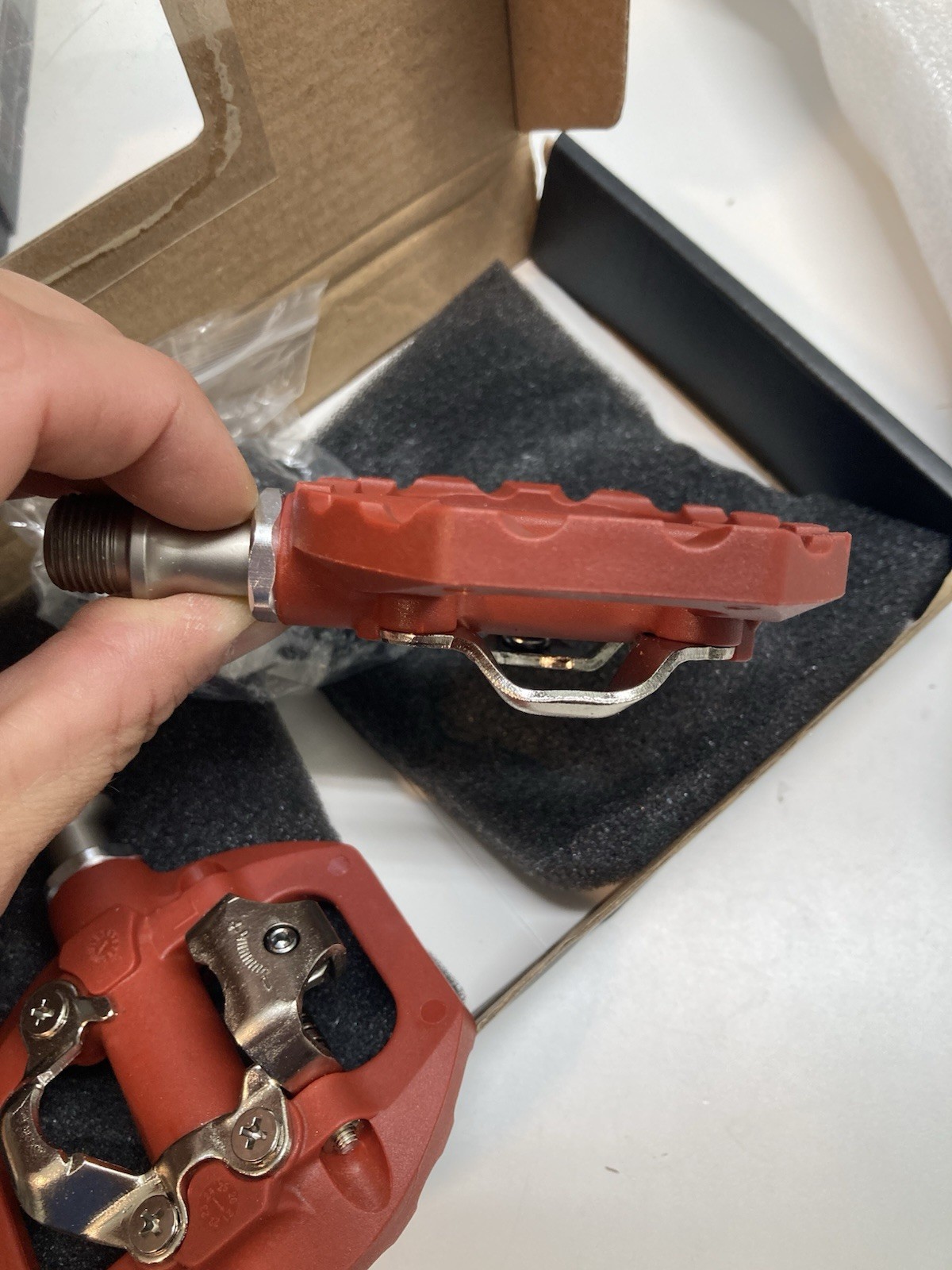 Red dual-sided clipless or flat platform mountain bike pedals fits Shimano SPD