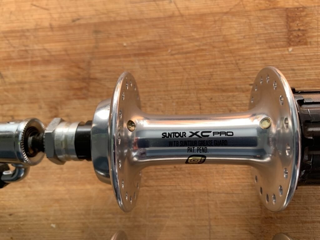 New NOS Suntour XC PRO Wtb Grease Guard hub set 7speed 36 holes quick release
