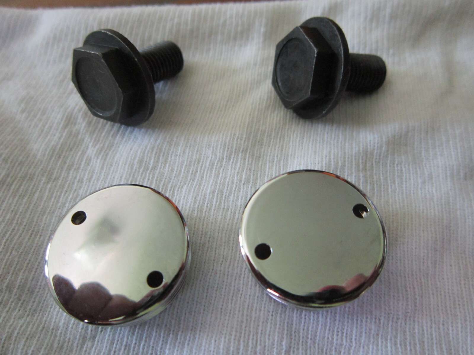 2 Shimano crank arm bolts and 2 crank arm caps N.O.S.