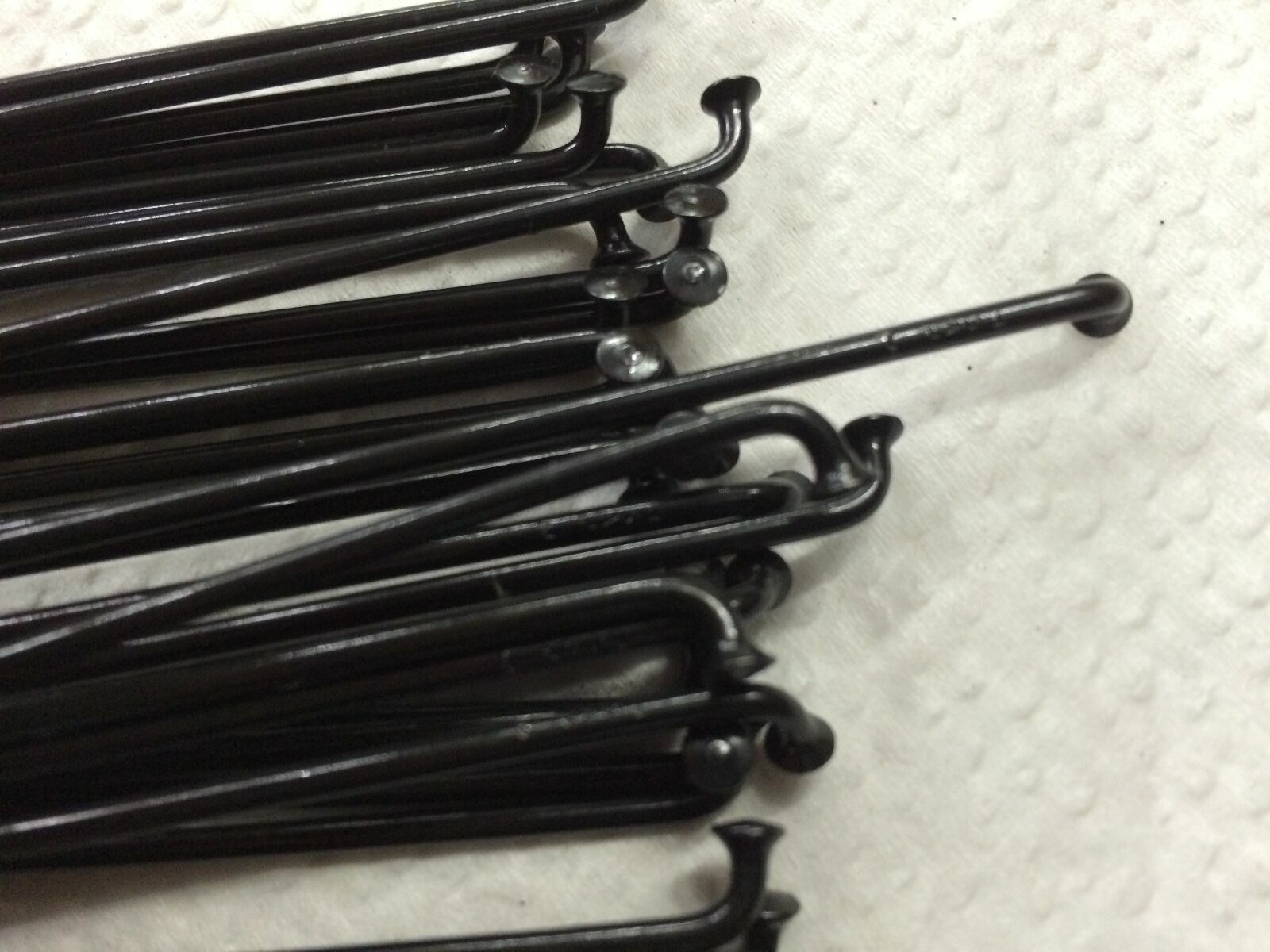 Black.14G(2mm)Sapim,J bend.Cut to any size 189-310mm. set of 32.Nipples Optional