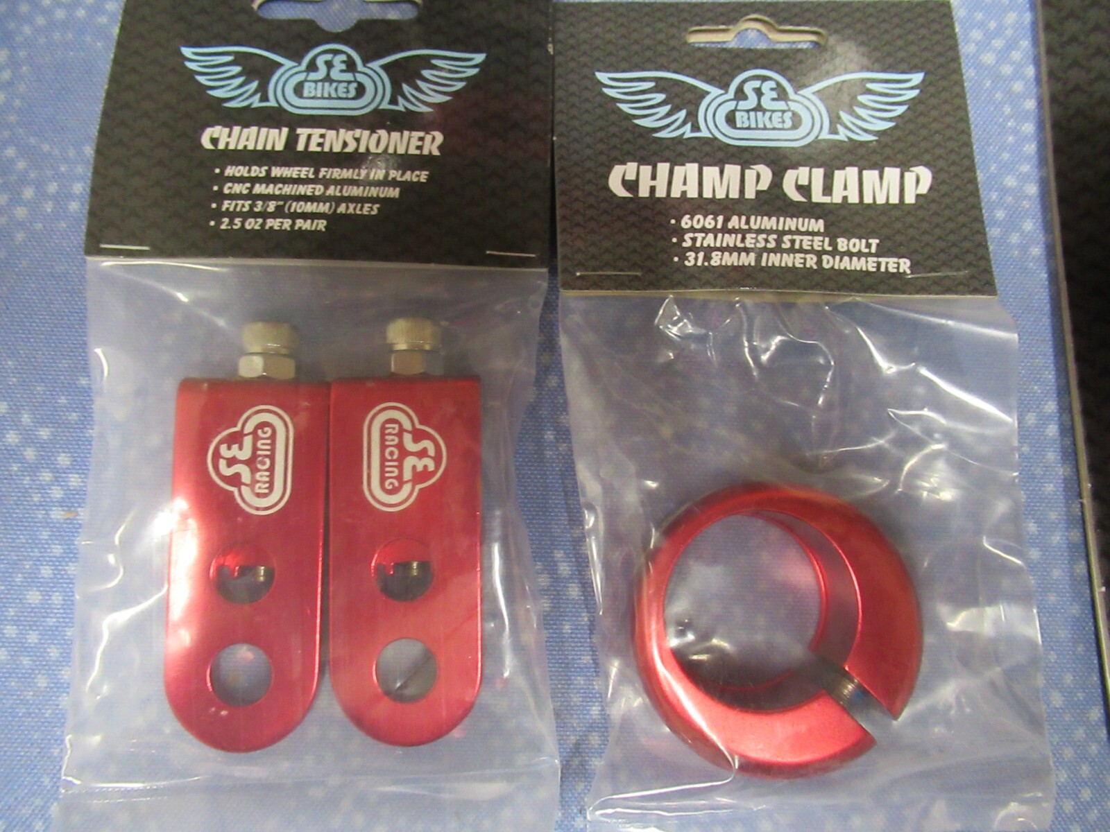 SE Bikes BMX Mix Lot-Pegs, Narler, Eluder Headset, Champ Clamp, Tensioner-Red