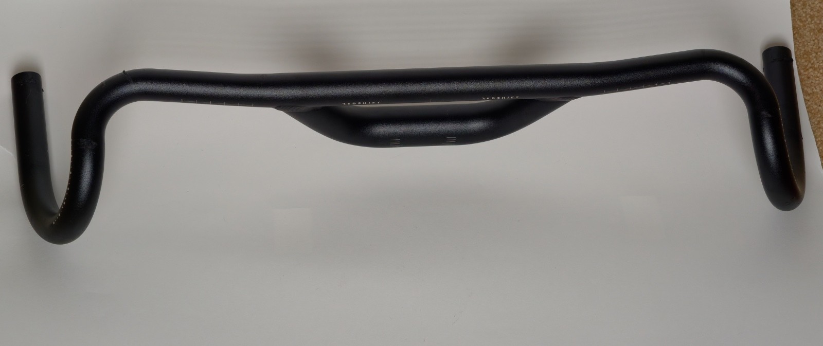 REDSHIFT Top Shelf Low Flare Handlebar Aluminum Drop 70mm of Rise, 50cm Width