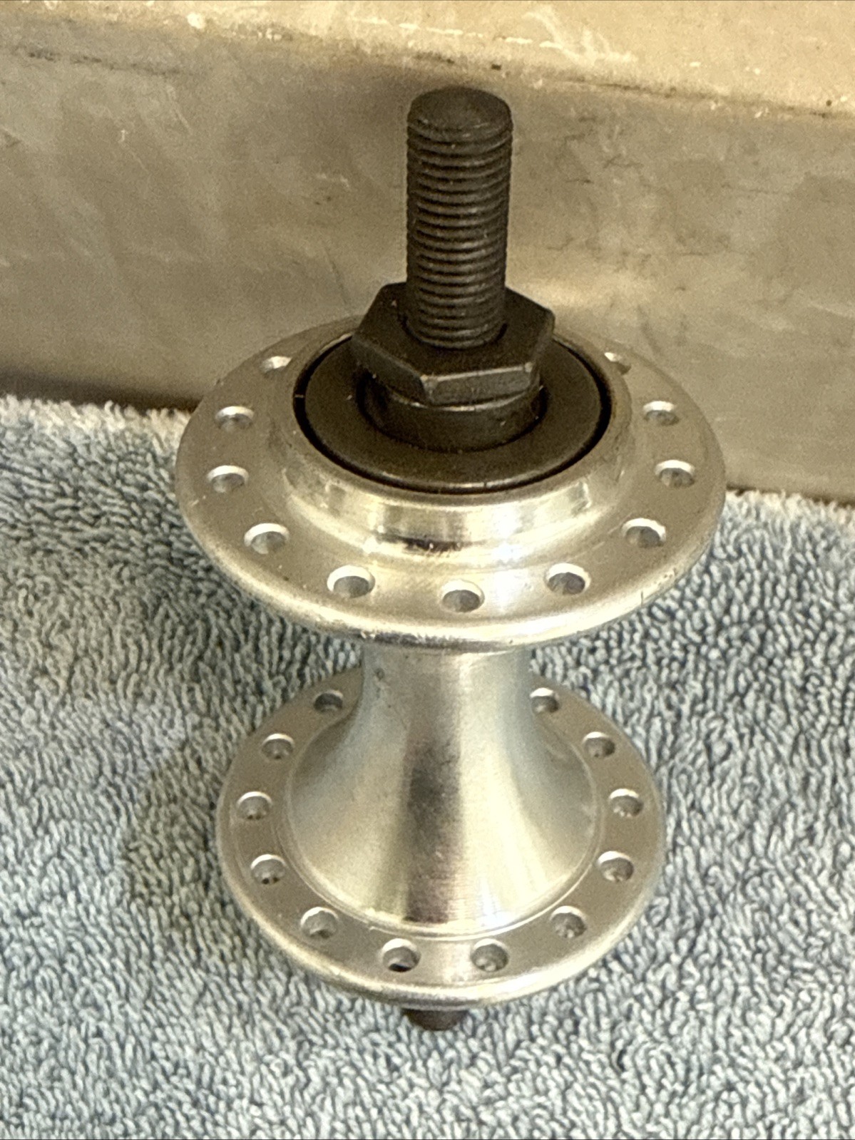 Brompton Front Hub 28h Silver -75mm Over Locknut Dimension – 114mm axle length