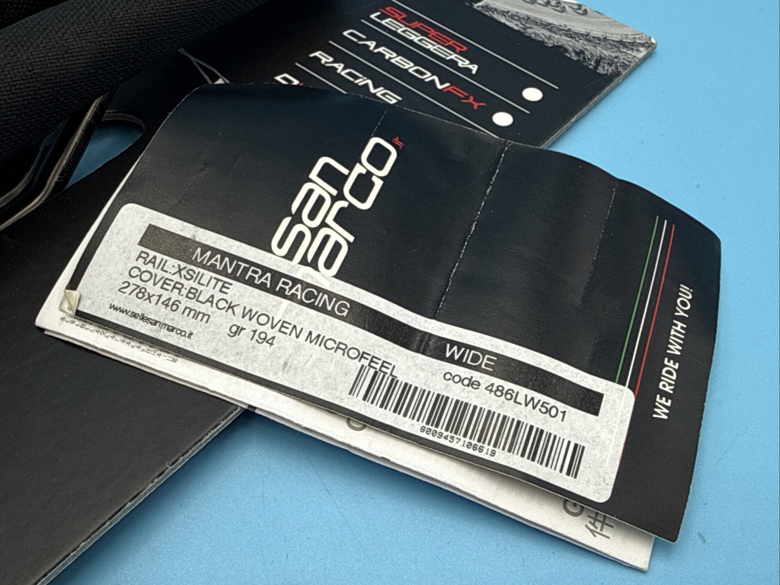 Selle San Marco MANTRA Racing Wide Black Woven Microfeel Saddle XSilite Rail