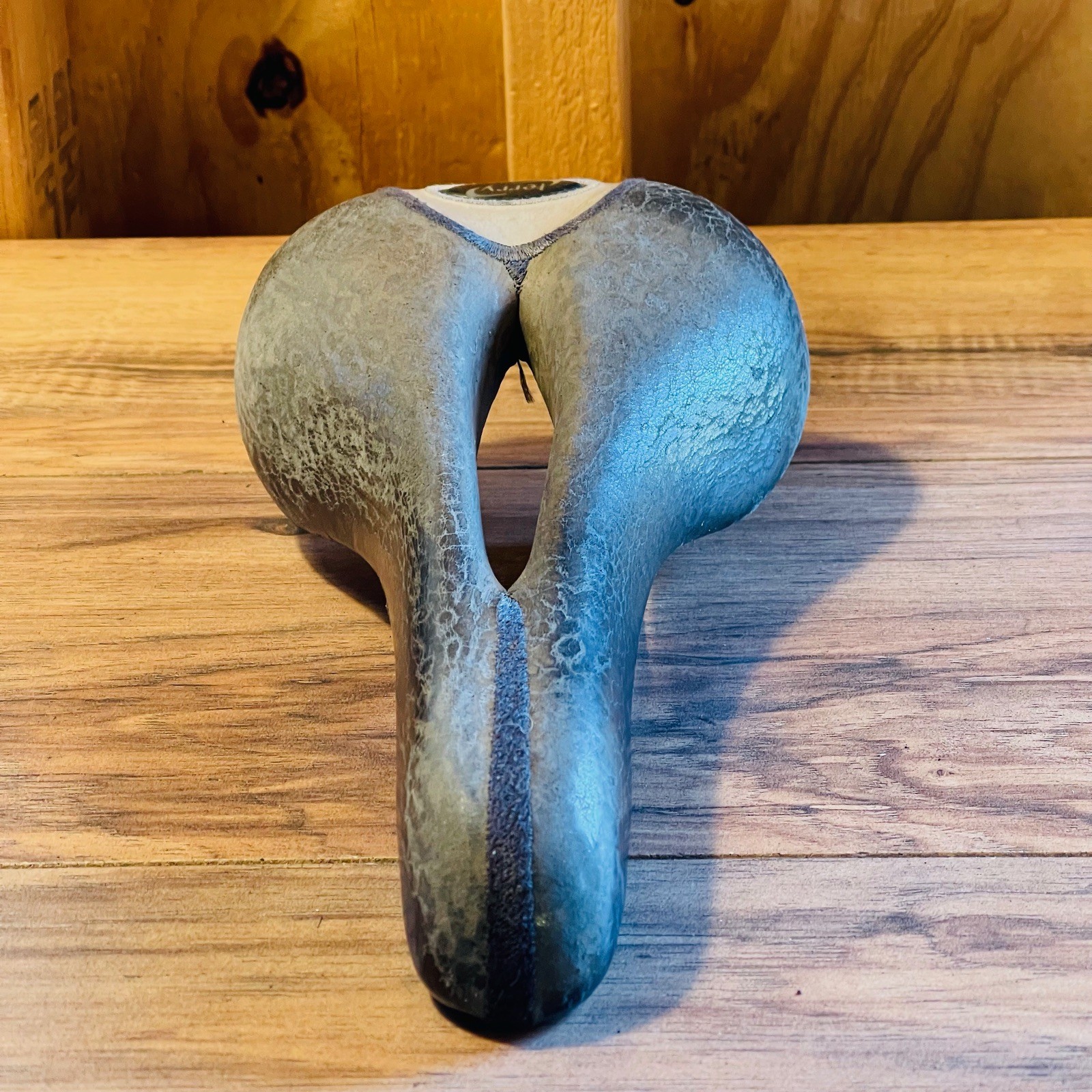 Terry  Cutaway Saddle Gray Leather Titanium Rails