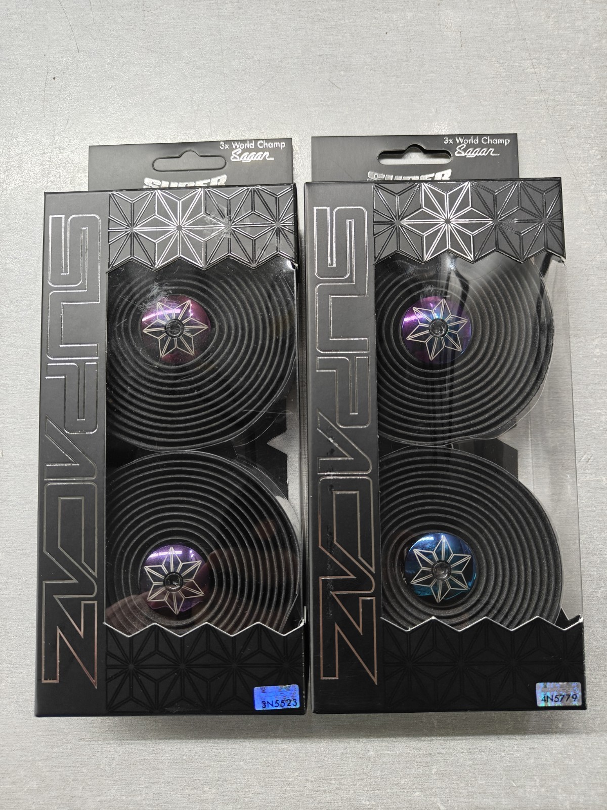 2-pack Supacaz Super Sticky Kush Tape – Star Fade Oil Slick wAnodized Plugs