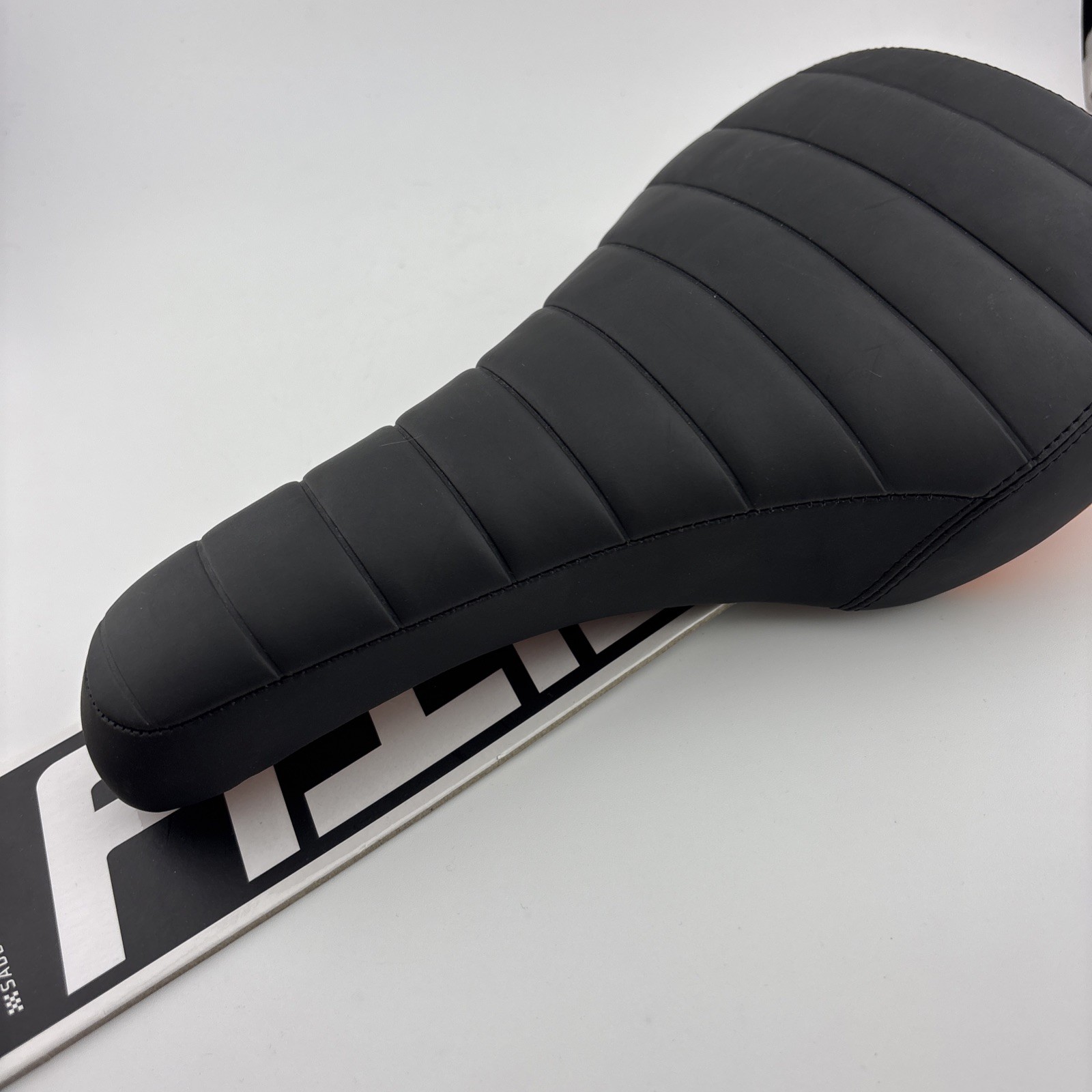 deity Frisco I- Beam Saddle Orange