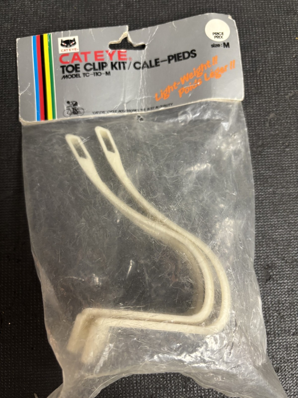 NOS Cateye Toe Clip Kit, white, medium mountain toe clips